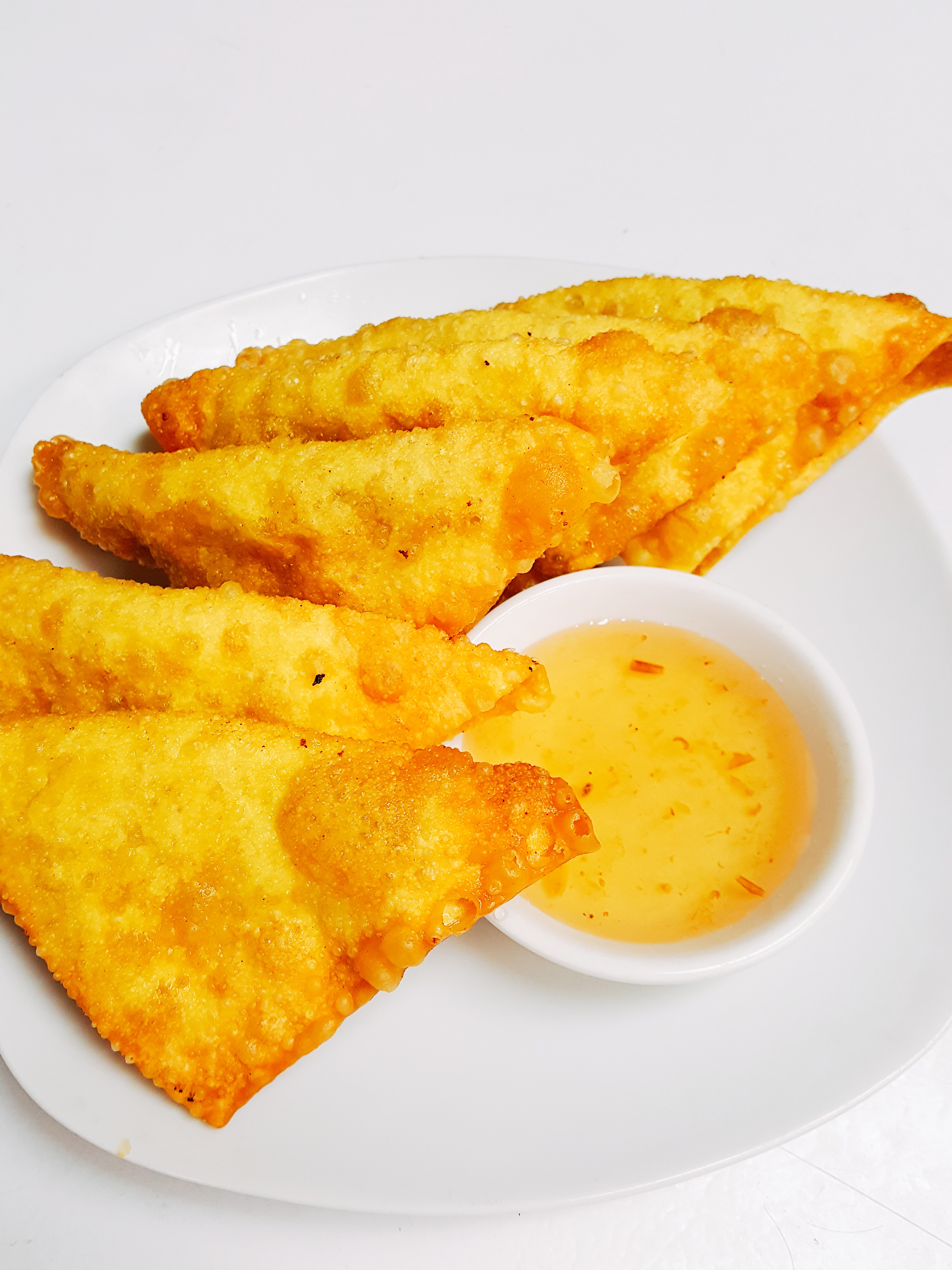 Order A6. 6 Pieces Fried Wonton food online from Kaow Thai Cuisine store, Beaverton on bringmethat.com