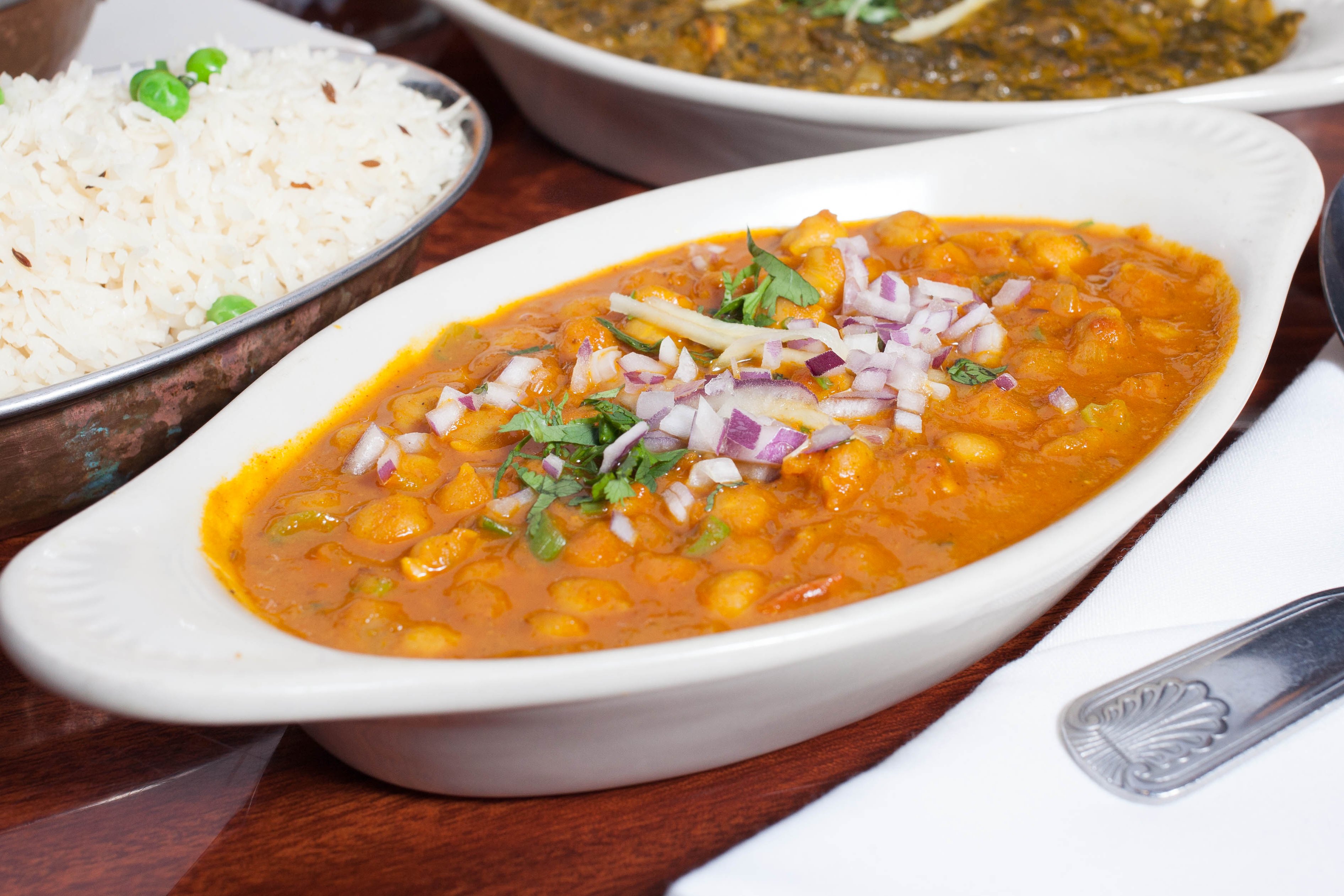 Order Chana Masala food online from Om Indian Cuisine store, San Francisco on bringmethat.com