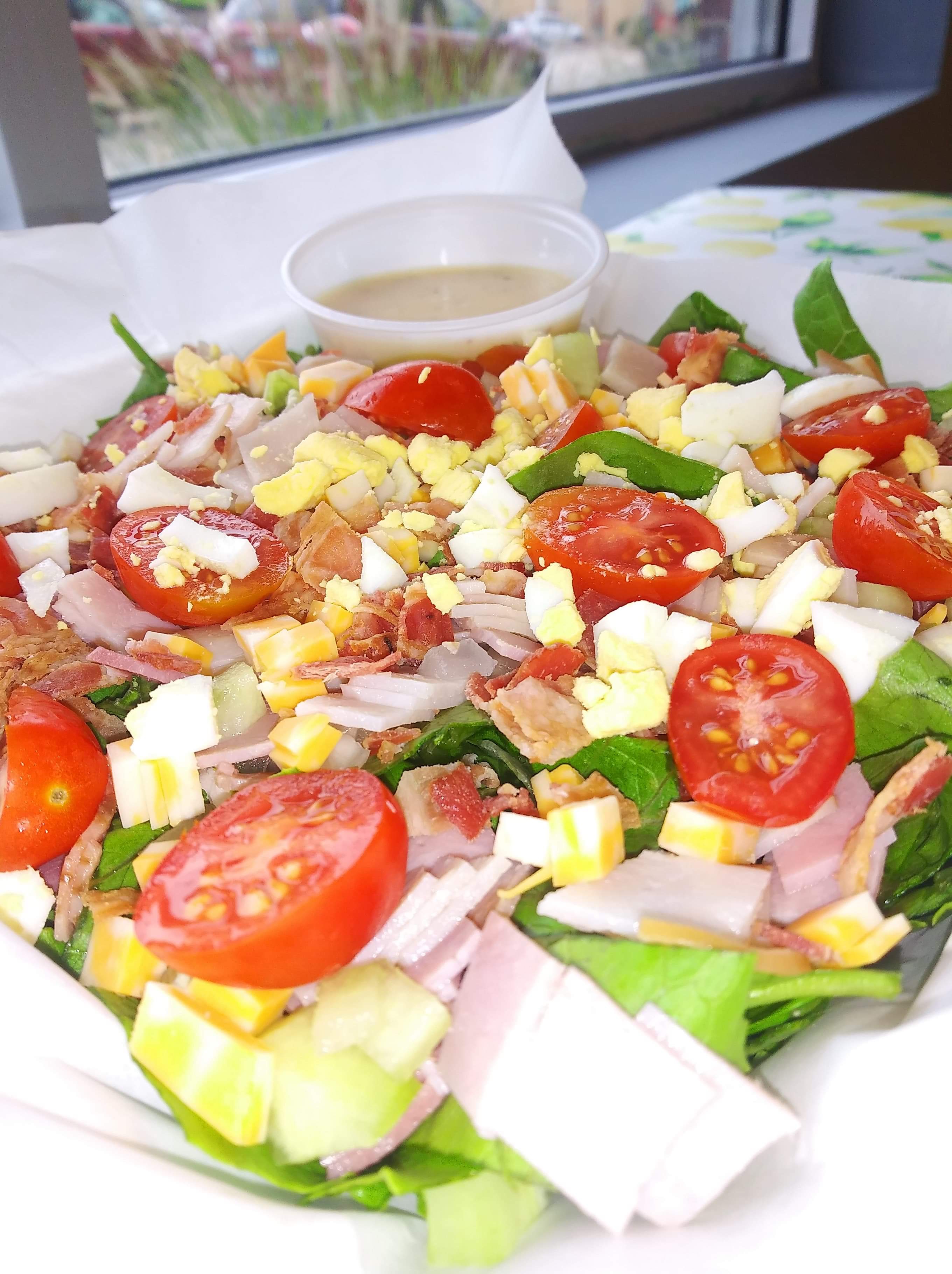 Order 7 Layer Salad food online from Pineapple Xpressed Cafe store, McHenry on bringmethat.com