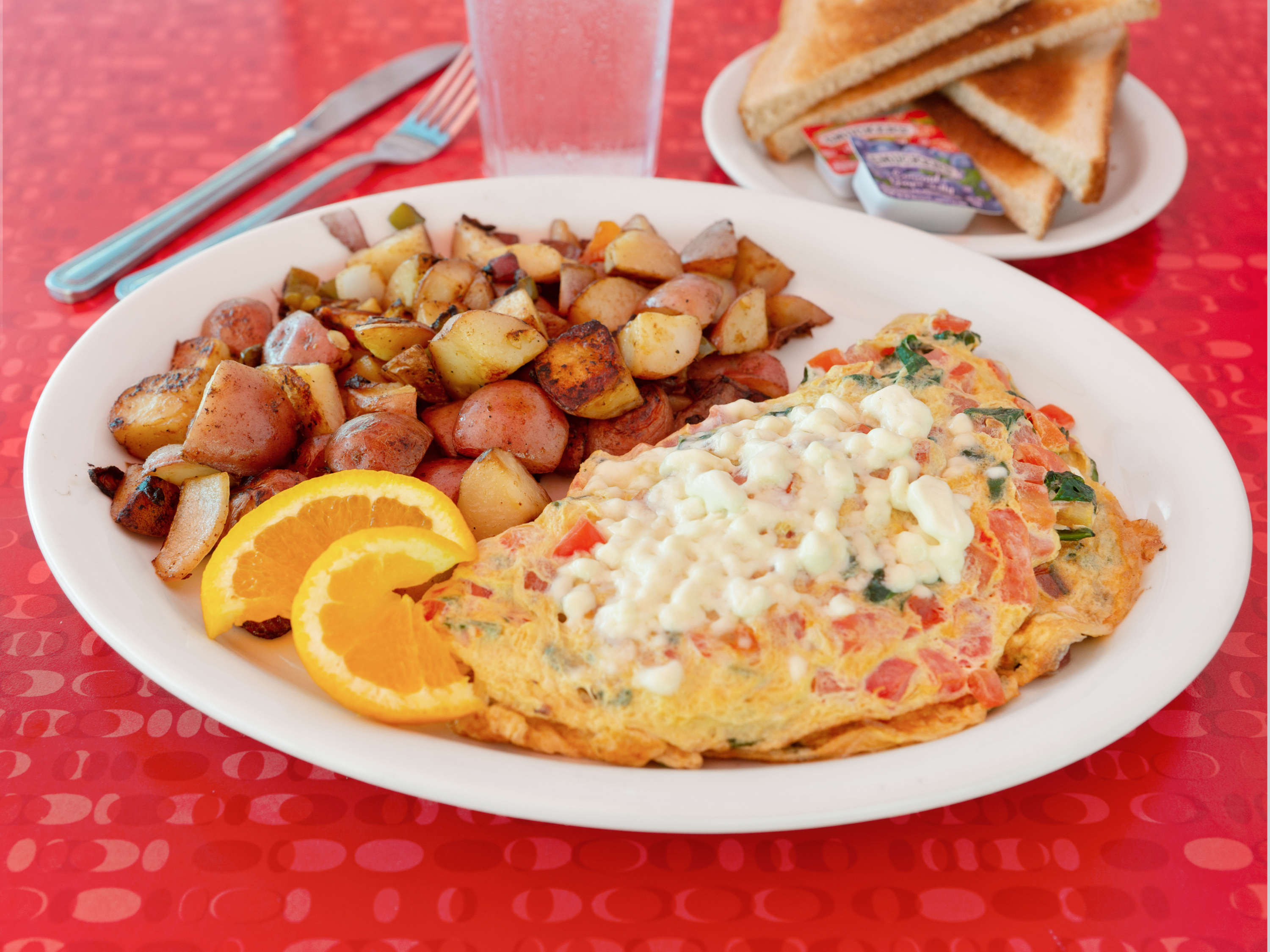 Order Spinach, Tomato and Feta Cheese Omelette food online from Mr D store, Placentia on bringmethat.com