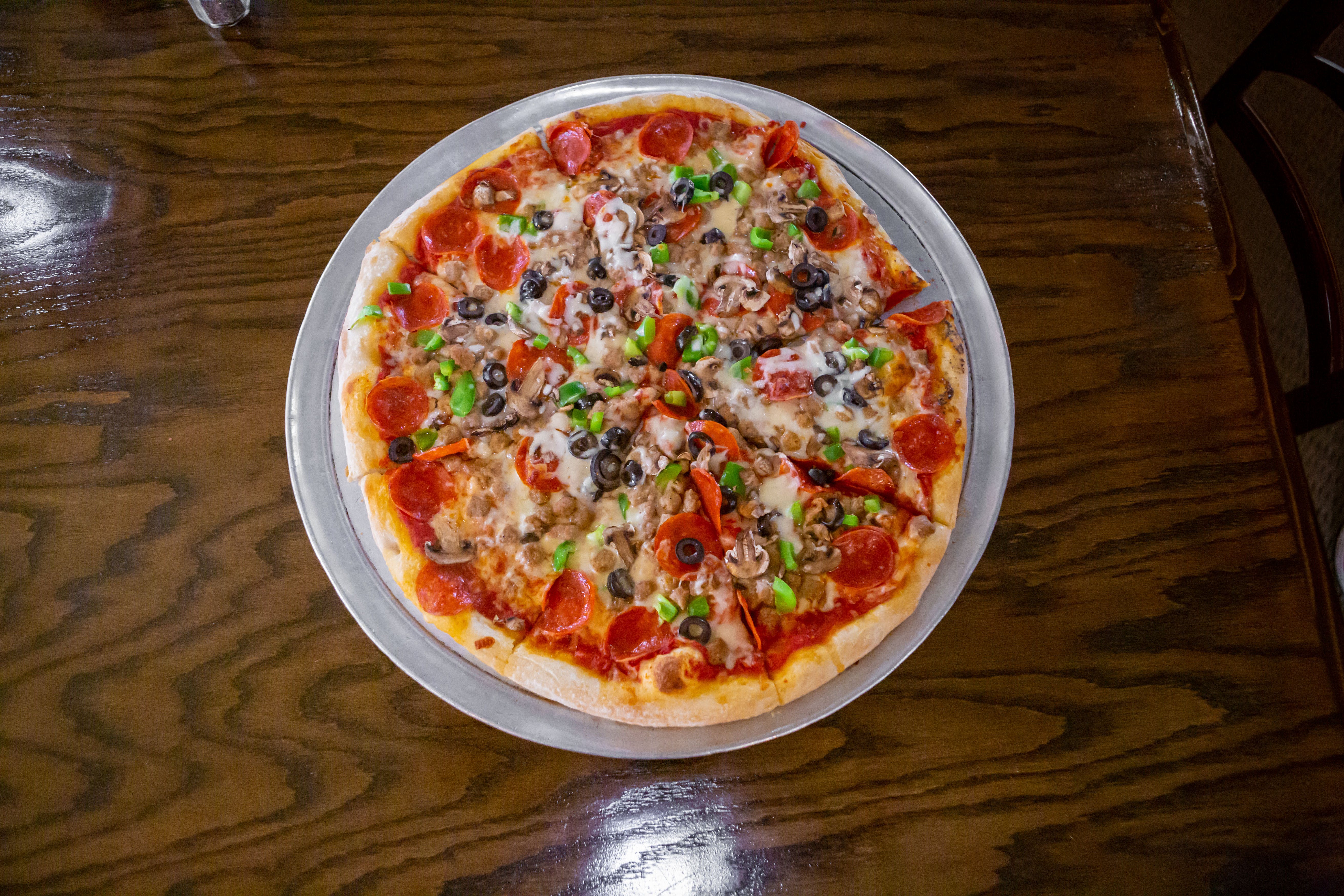 Order Special Pizza - 10'' food online from Napolis Italian Restaurant store, Terrell on bringmethat.com