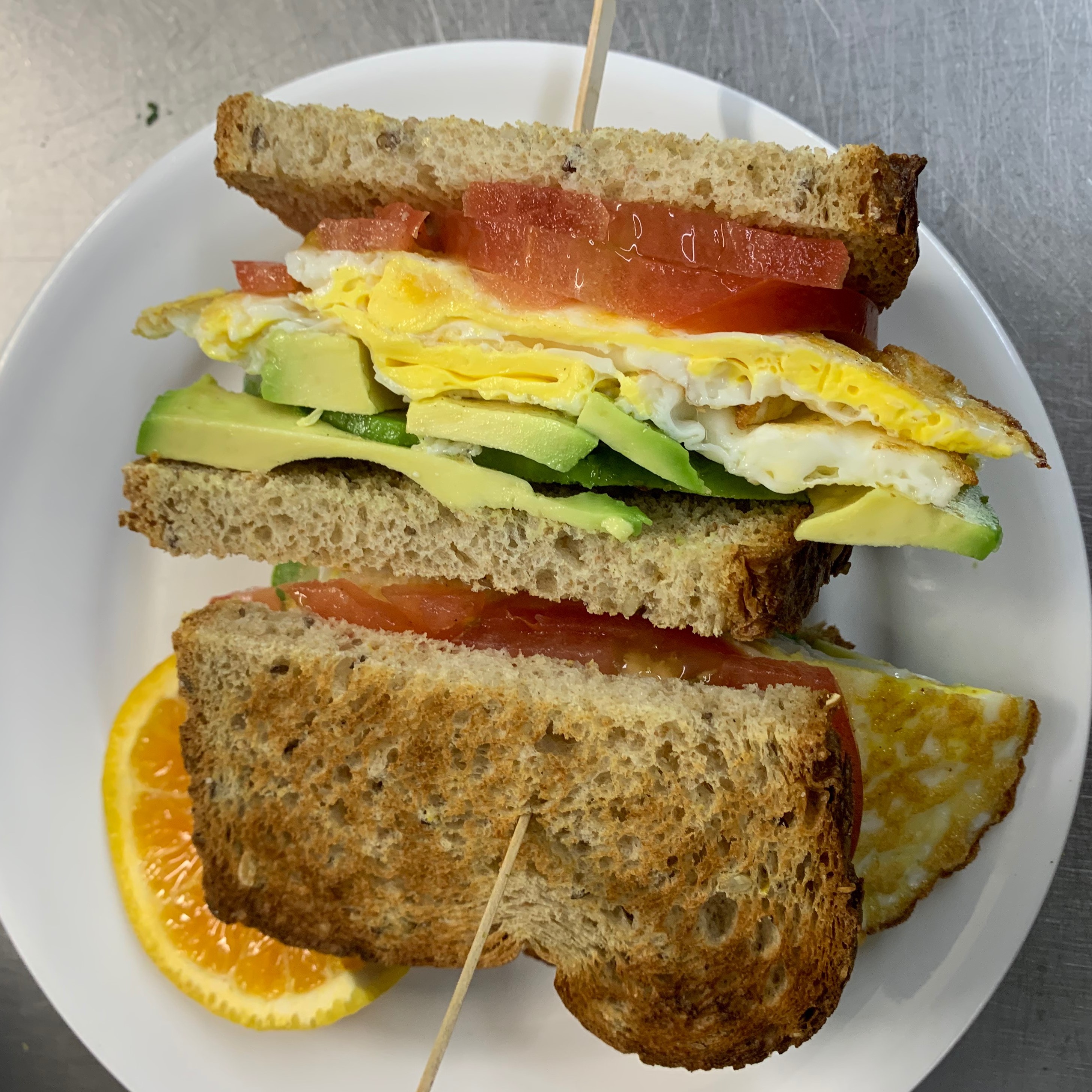 Order Avocado Toast with Eggs food online from Sunrise Coffee House store, Bloomingdale on bringmethat.com