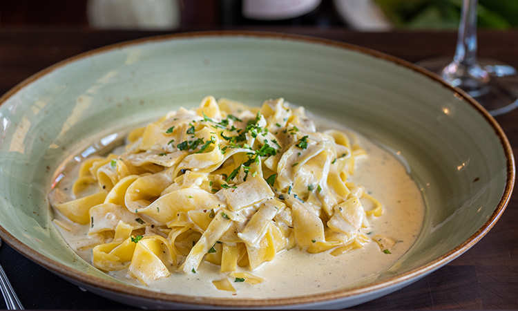 Order Fettuccine Alfredo food online from New York Pizzeria store, Pearland on bringmethat.com