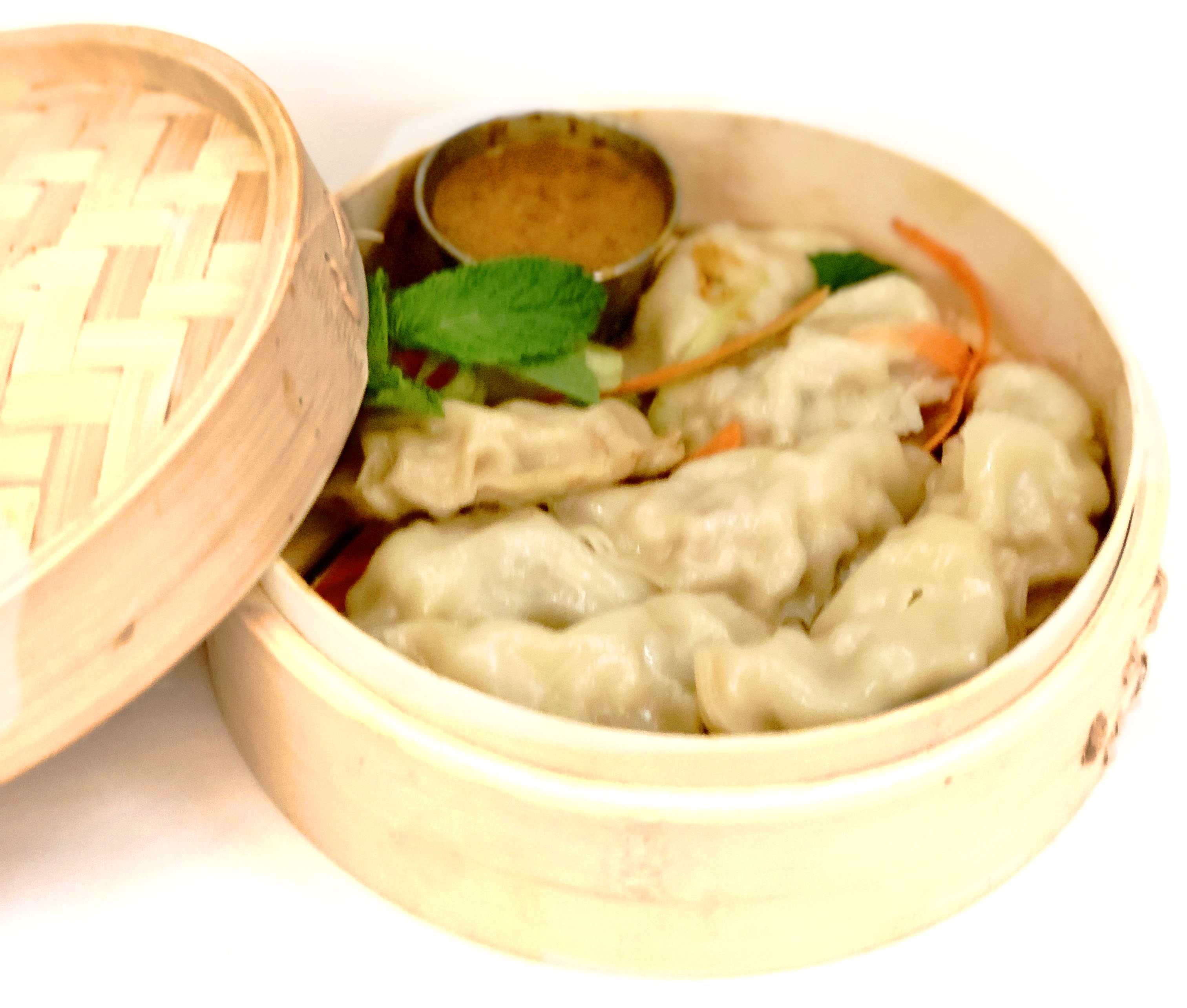 Order 3. Meat Momo food online from Himalayan Grill store, Flagstaff on bringmethat.com