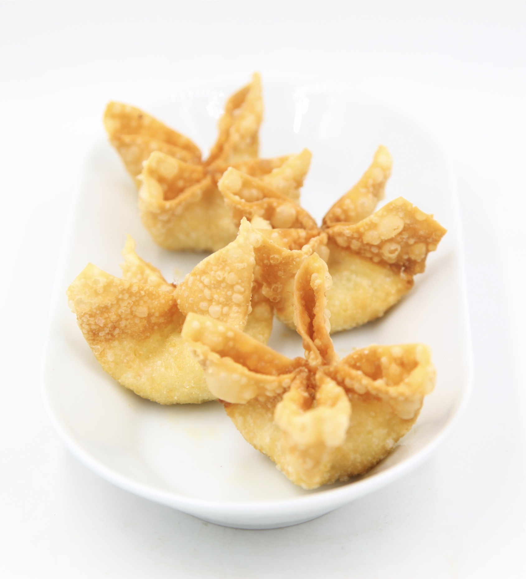 Order 8 Pieces Crab Rangoon 蟹角 food online from IQ Kitchen store, Newton Highlands on bringmethat.com