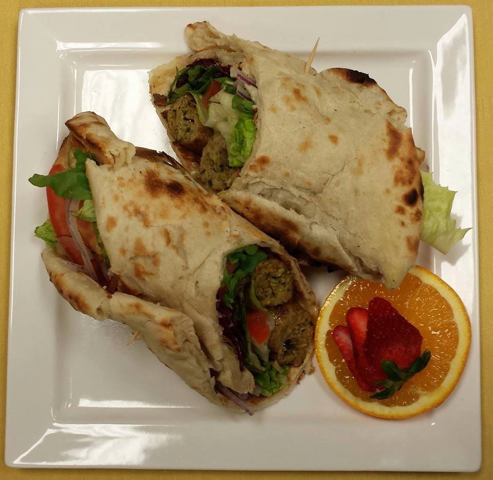 Order Tandoori Chicken Wrap food online from Kababish Cafe store, Cary on bringmethat.com