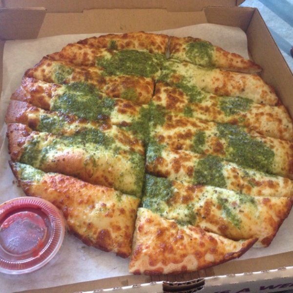 Order Pesto Cheese Breadsticks food online from A Pizza Mart store, Seattle on bringmethat.com