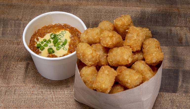 Order CHILI CHEESE TOTS food online from Doghaus Biergarten store, Colorado Springs on bringmethat.com