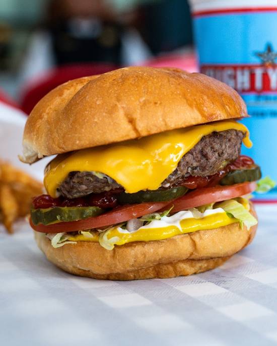 Order Junior 1/4 lb Cheeseburger food online from Mighty Fine Burgers store, Round Rock on bringmethat.com