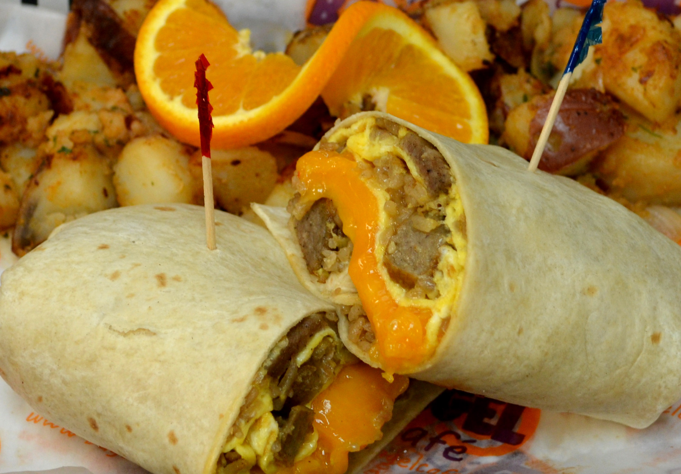 Order New Orleans Omelet Wrap food online from Bagel Cafe store, Herndon on bringmethat.com