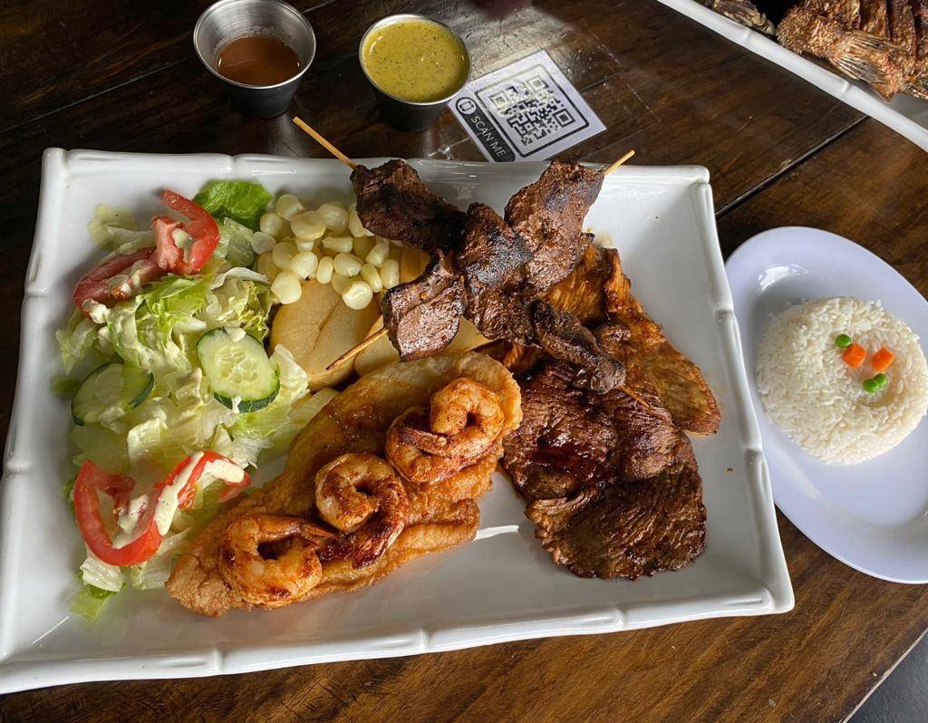 Order Parrilla Mar y Tierra ( sea food and meat on the grill ) food online from The Brasa Bar & Grill store, Richardson on bringmethat.com