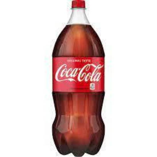 Order Coca-Cola 2L Bottle food online from IV Deli Mart store, Goleta on bringmethat.com