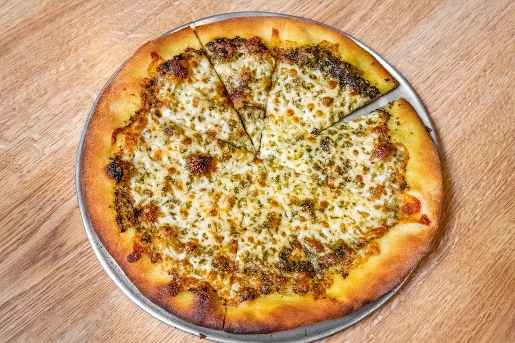 Order Pesto Pizza - Small 12'' food online from Bella Italia store, Ennis on bringmethat.com