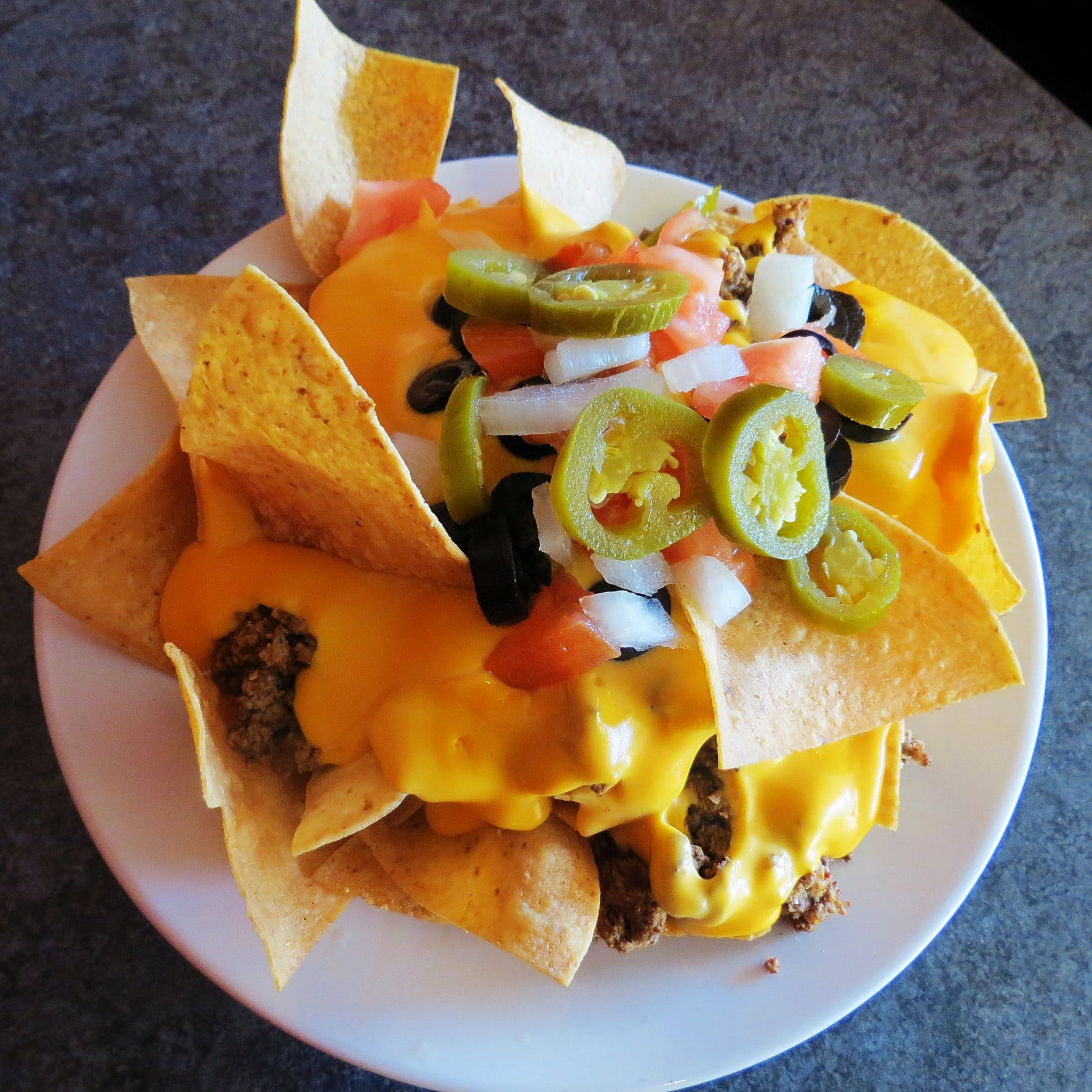Order Nachos - Appetizer food online from Nicky's Pizza store, Sheboygan on bringmethat.com
