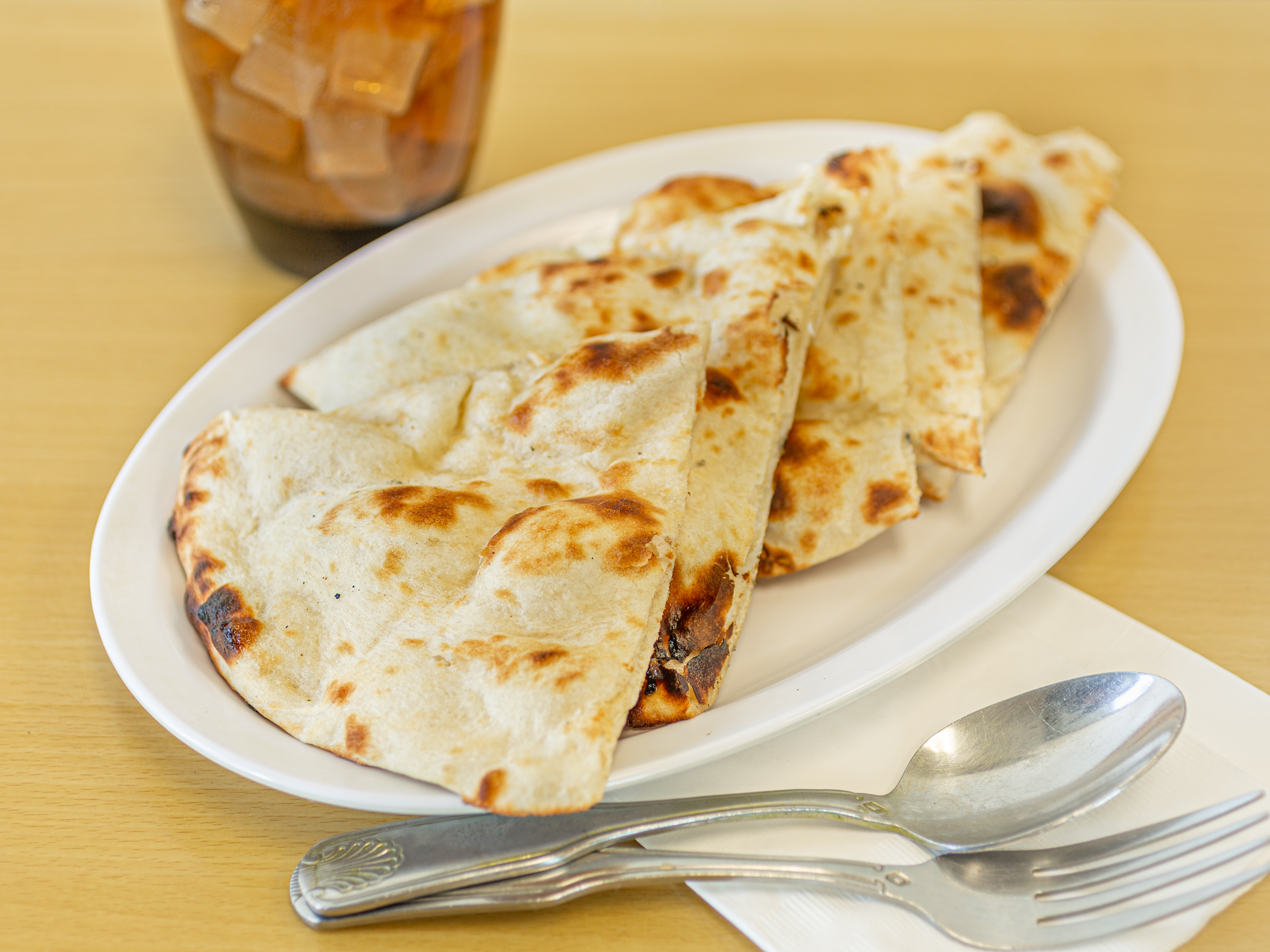 Order Plain Naan food online from Quality Of Bombay store, Lawndale on bringmethat.com