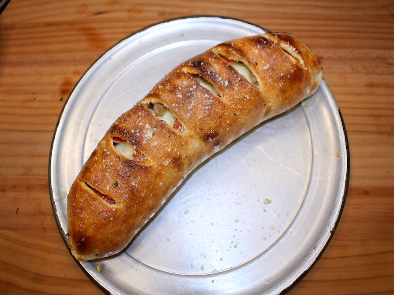 Order Sausage and Pepper Stromboli food online from Stefano's Pizza Express store, Pharr on bringmethat.com