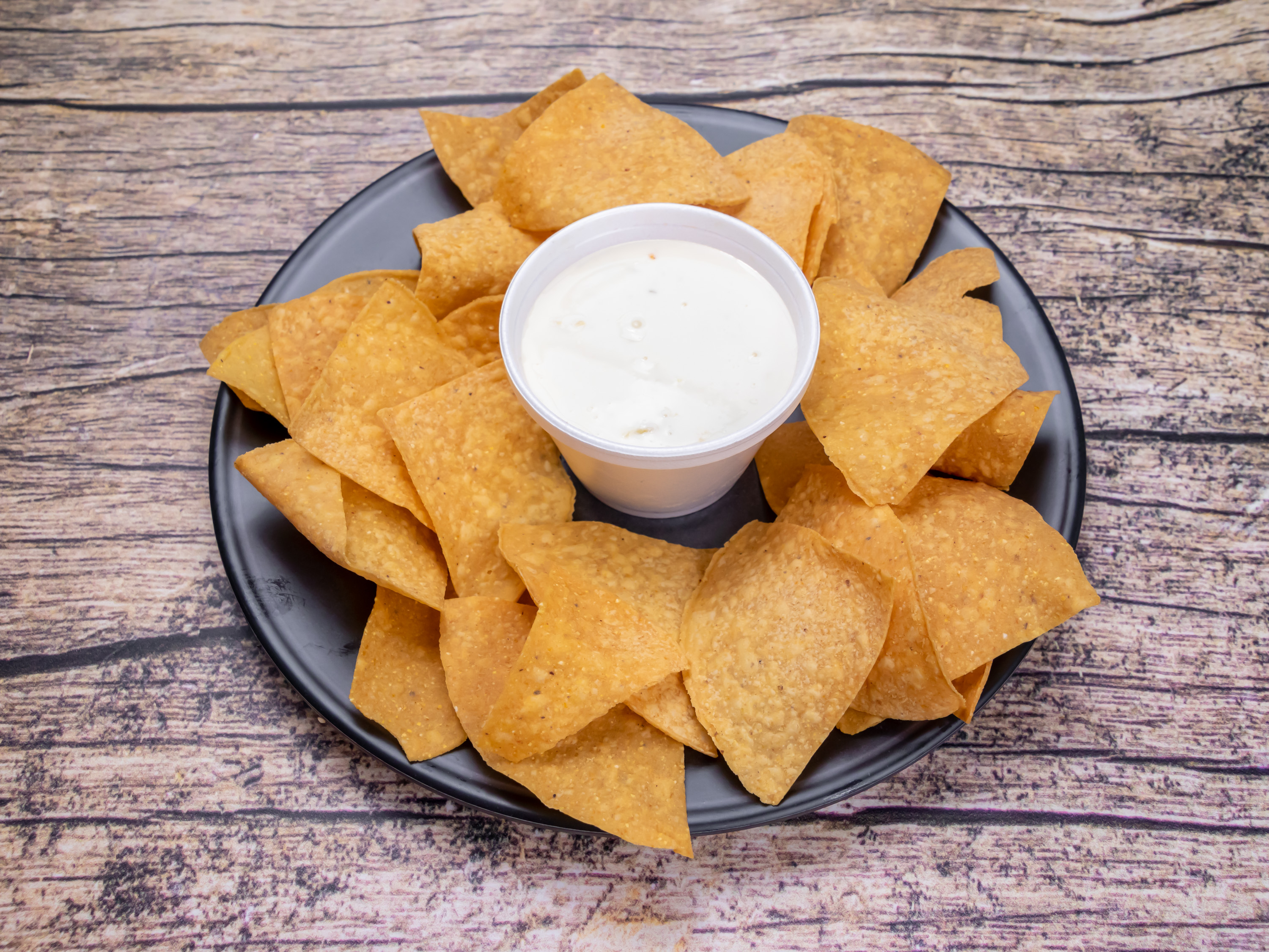 Order Cheese Dip 6 oz. food online from Lil Kiko Taqueria store, Roswell on bringmethat.com