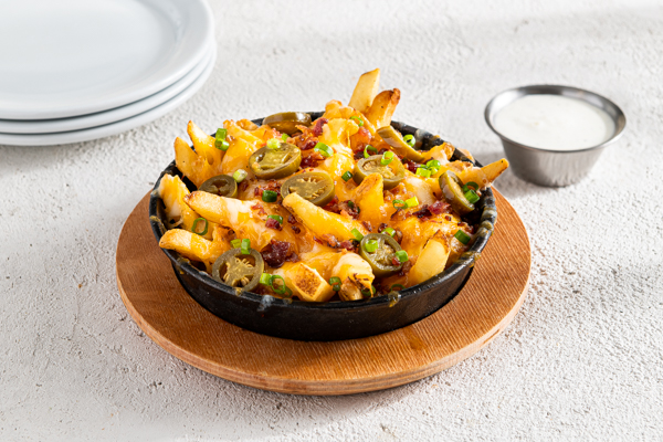 Order Texas Cheese Fries - Half food online from Chili Grill & Bar store, Casa Grande on bringmethat.com
