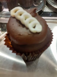 Order Chocolate Cream Cupcake food online from Small Cupcakes and Cake Factory store, Raleigh on bringmethat.com
