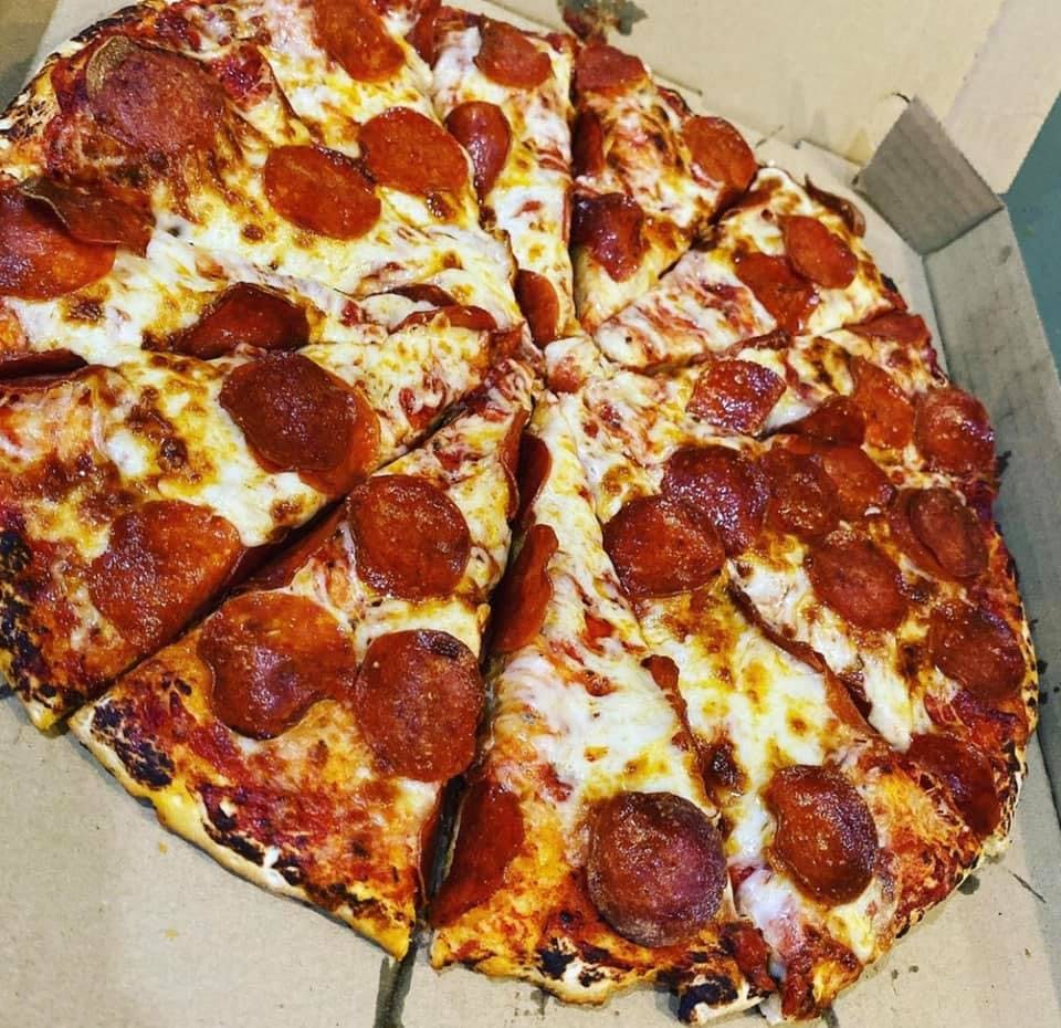 Order One Topping Cheese Pizza - Small 10'' (Serves 2 People) food online from Rico's Pizza store, Los Banos on bringmethat.com