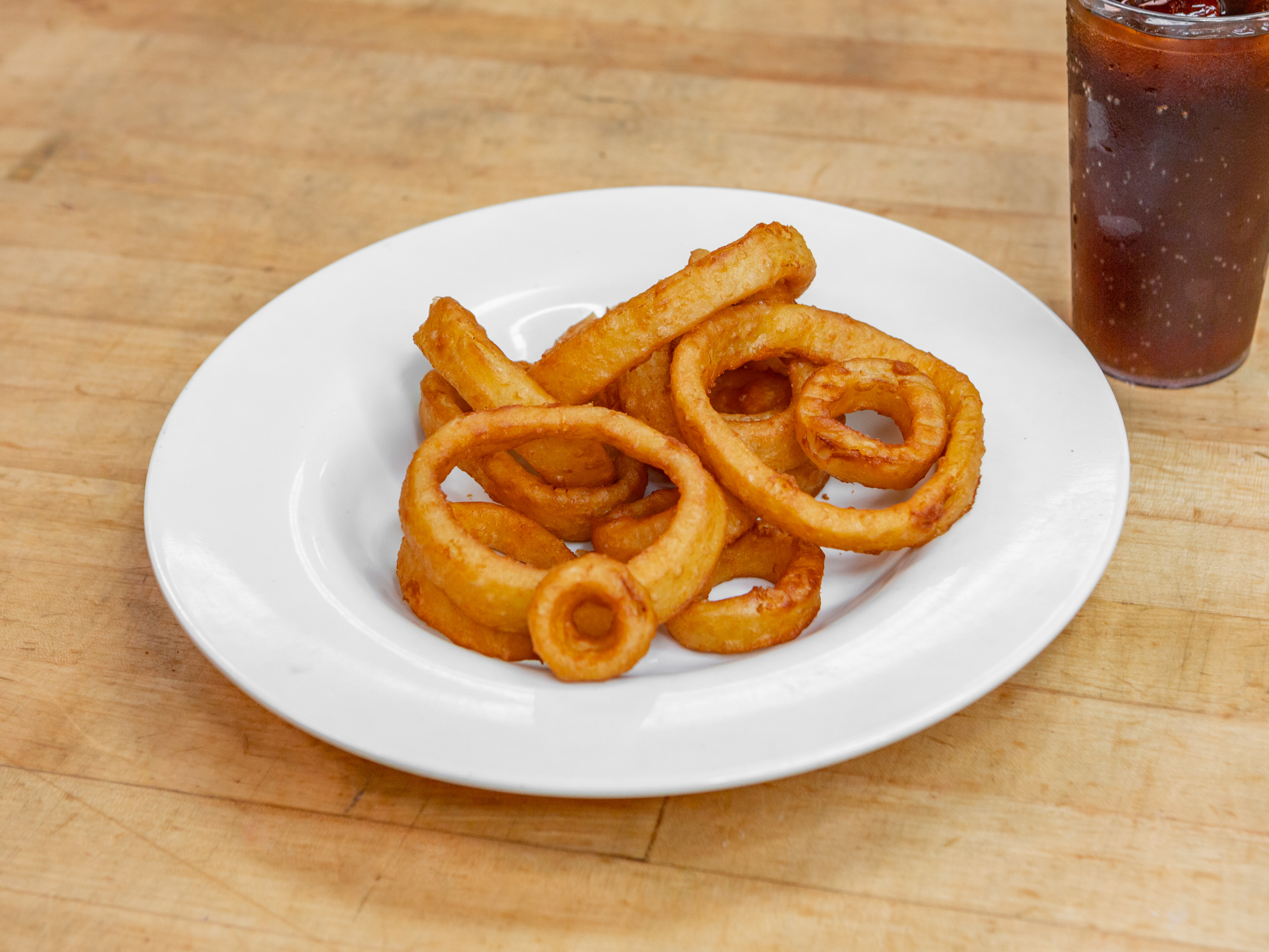 Order Onion Rings food online from Guidos Pizza store, Anchorage on bringmethat.com