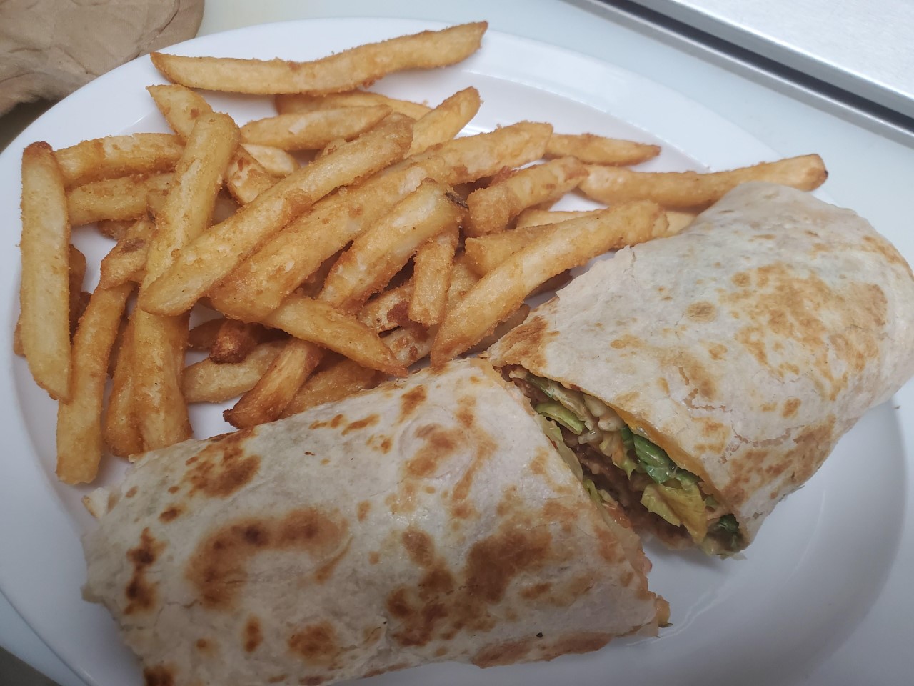 Order Buffalo Chicken Wrap food online from Crown Point Crab House store, Charlotte on bringmethat.com