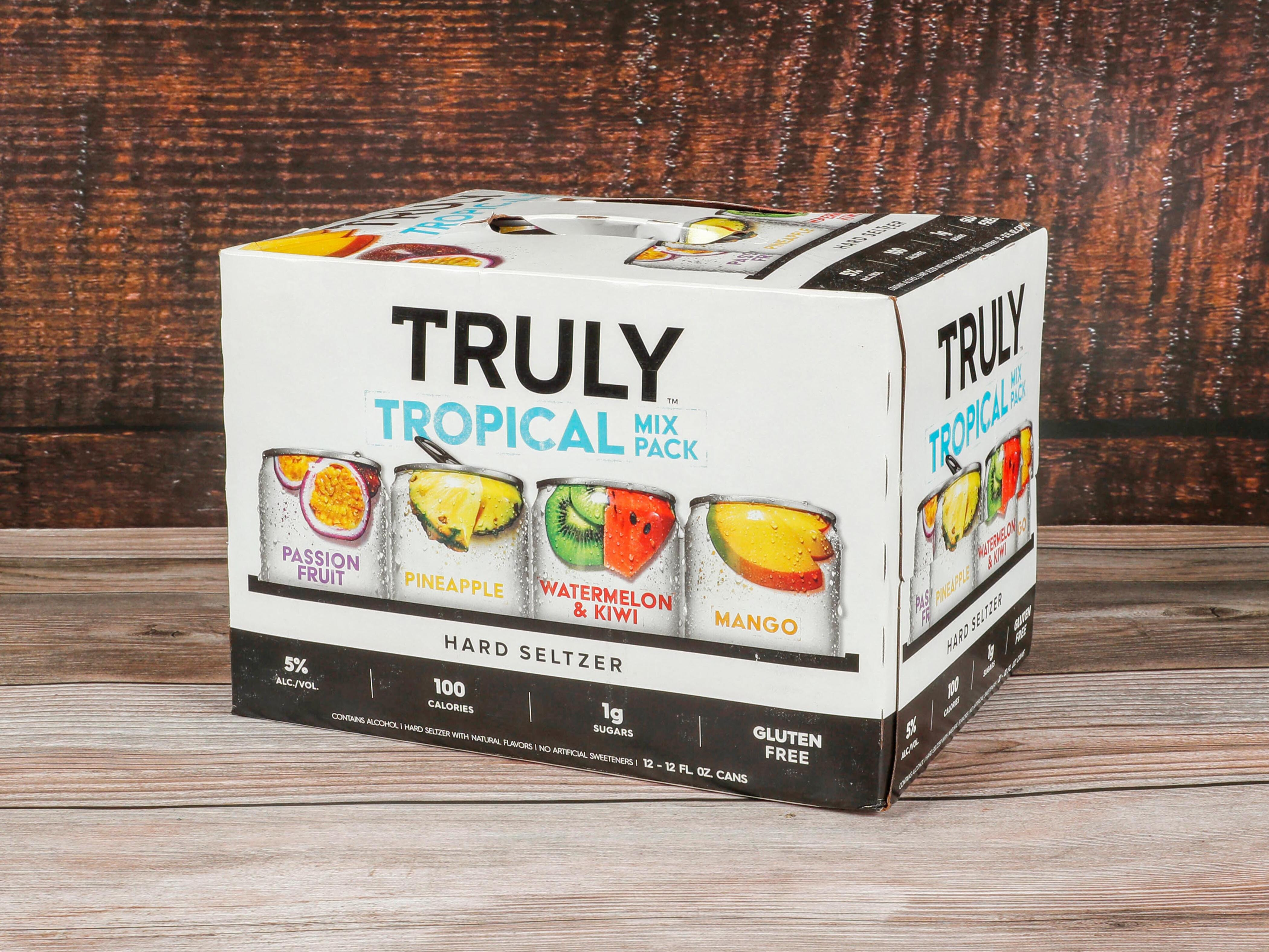 Order Truly Hard Tropical Mix, 12 Pack, 12 oz. Spiked Sparkling Water (5.0% ABV) food online from Kwik & Convenient store, San Francisco on bringmethat.com