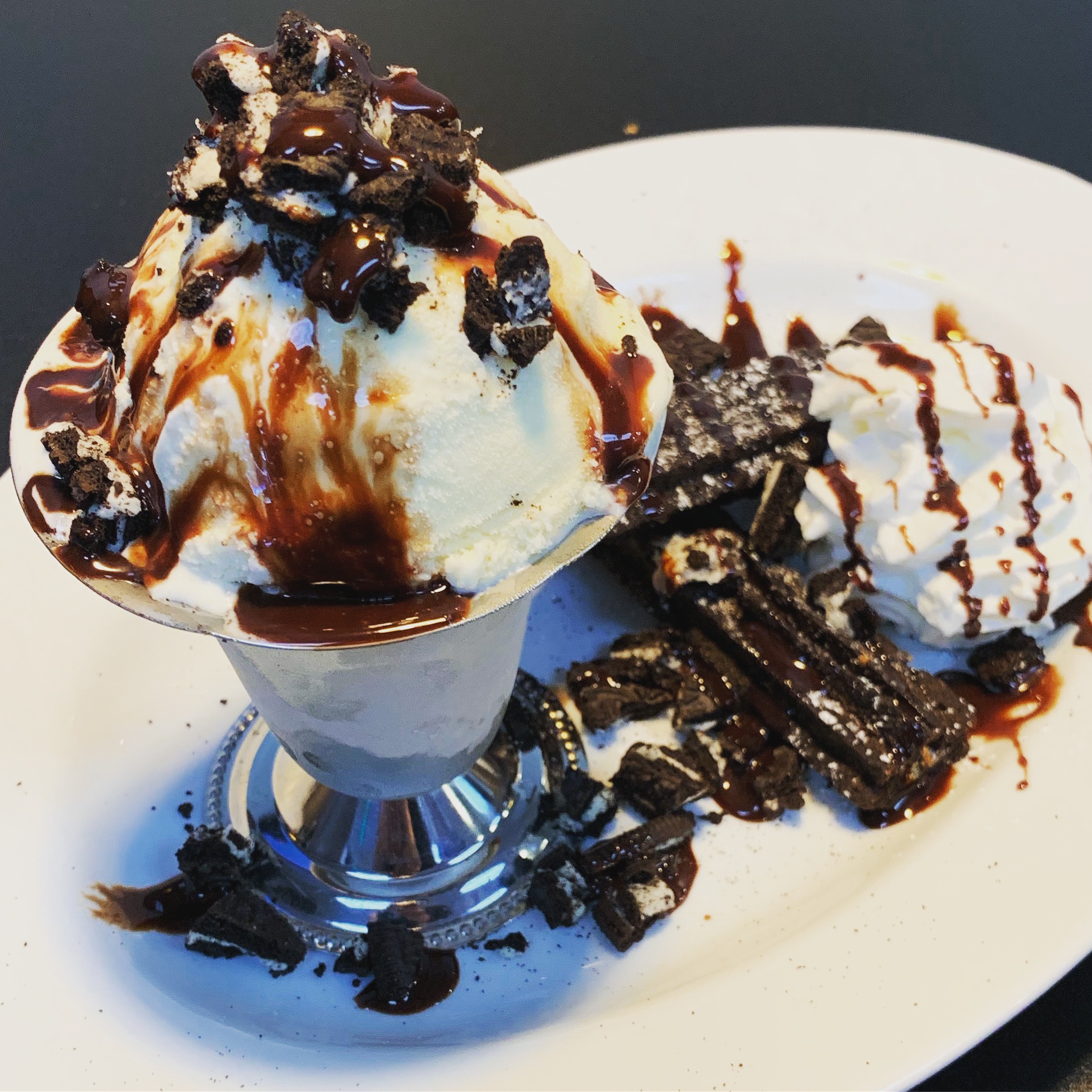 Order Cookies and Cream Churro Sundae food online from The Bearded Lady Pub store, Canyon Country on bringmethat.com