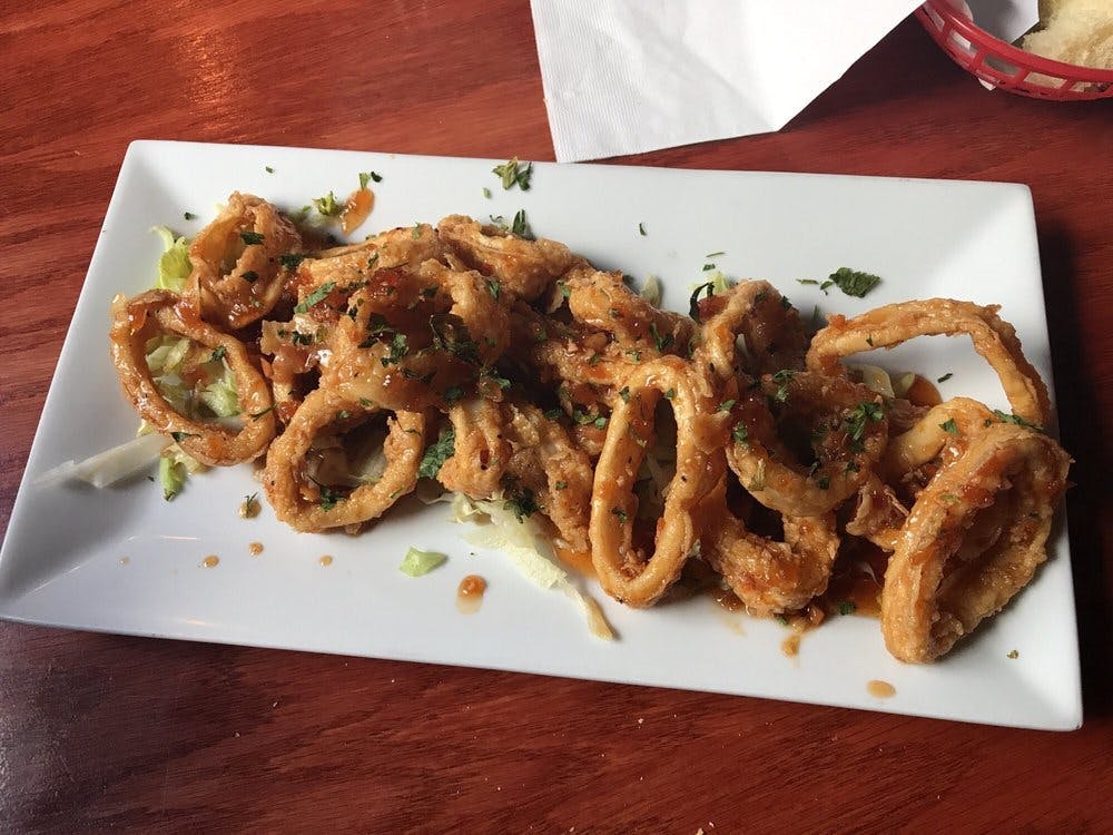 Order Fried Calamari - Appetizer food online from Fratelli Pizza Cafe store, Edison on bringmethat.com