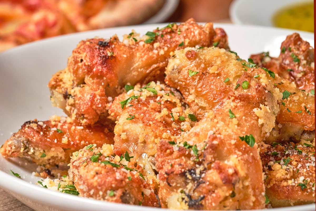 Order Twice-Baked Brick Oven Garlic Parmesan Chicken Wings food online from Bertucci store, Nashua on bringmethat.com