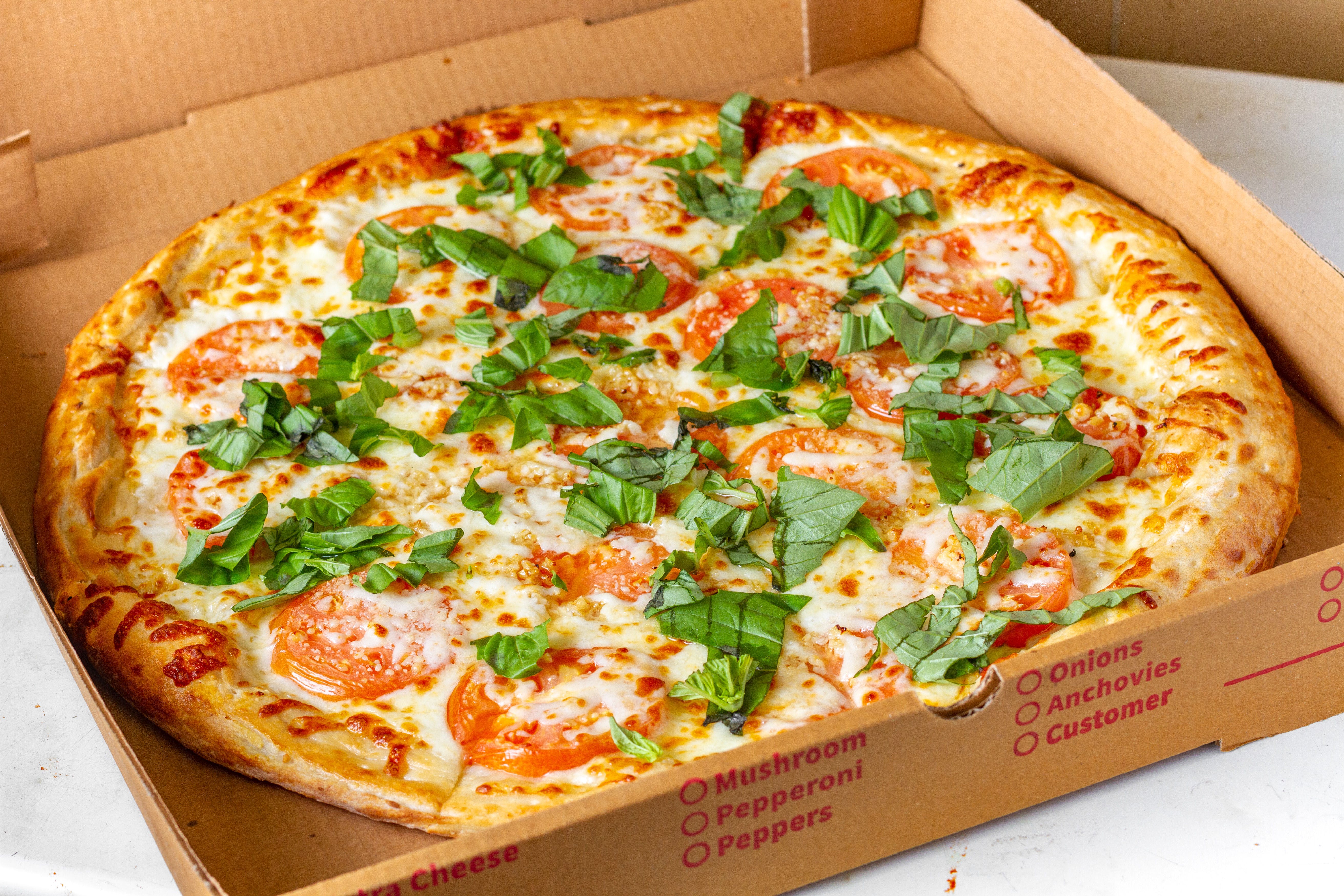 Order Margarita Pizza - Medium 12'' food online from Mikie's Pizza & Subs store, Baltimore on bringmethat.com