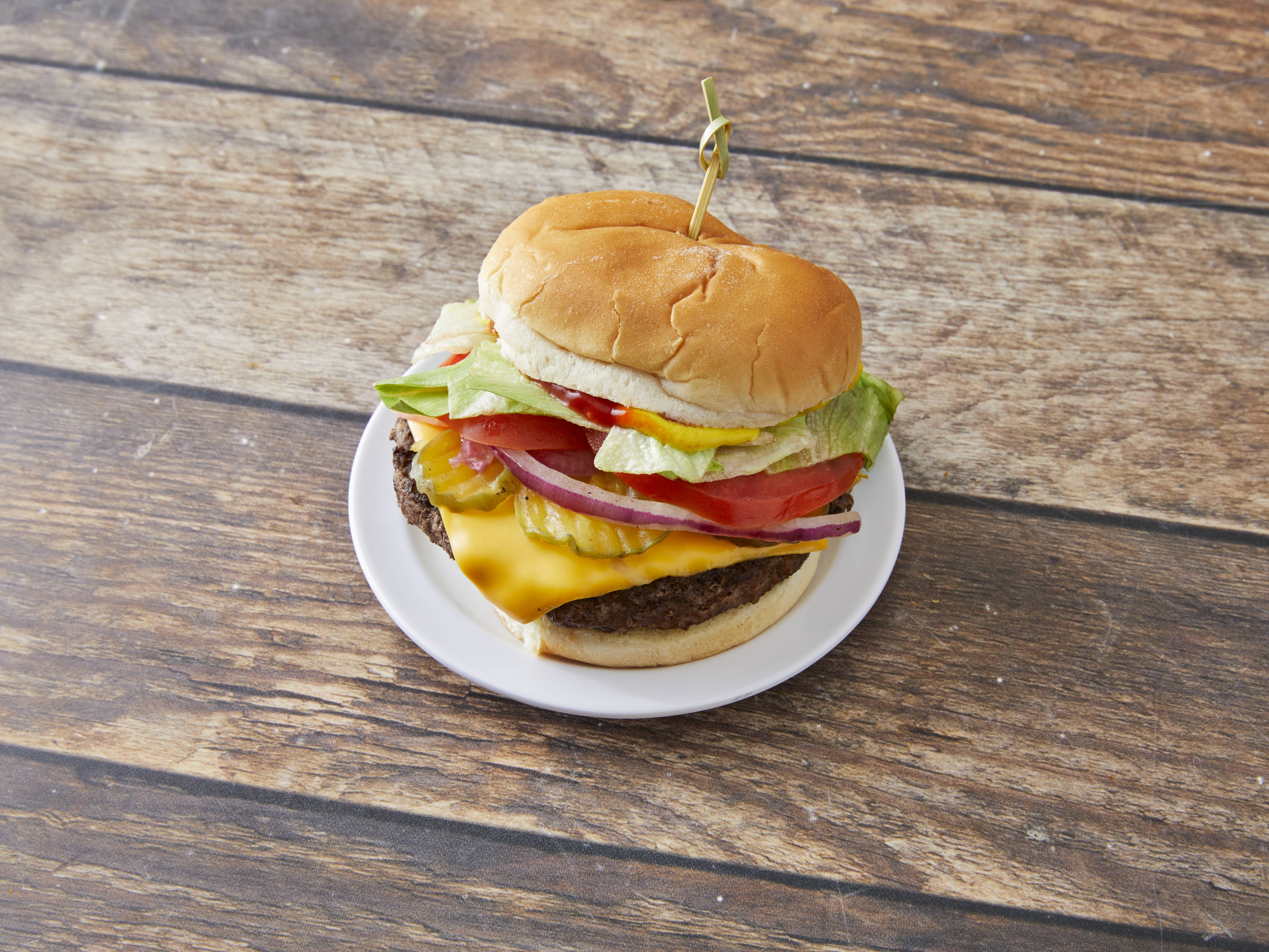 Order 1/2 lb. Cheeseburger food online from Papa Pizza store, Detroit on bringmethat.com