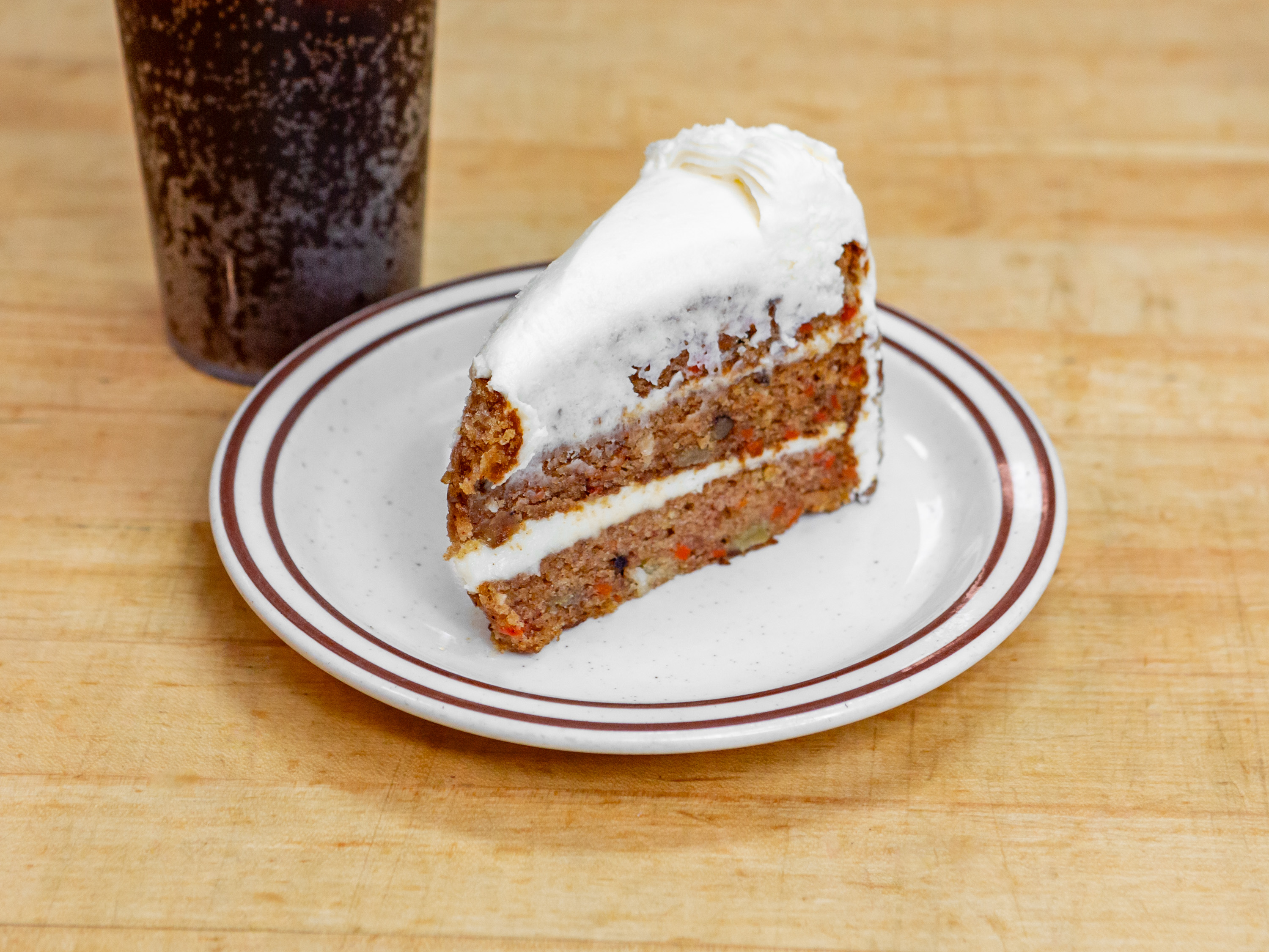 Order Carrot Cake food online from Guidos Pizza store, Anchorage on bringmethat.com