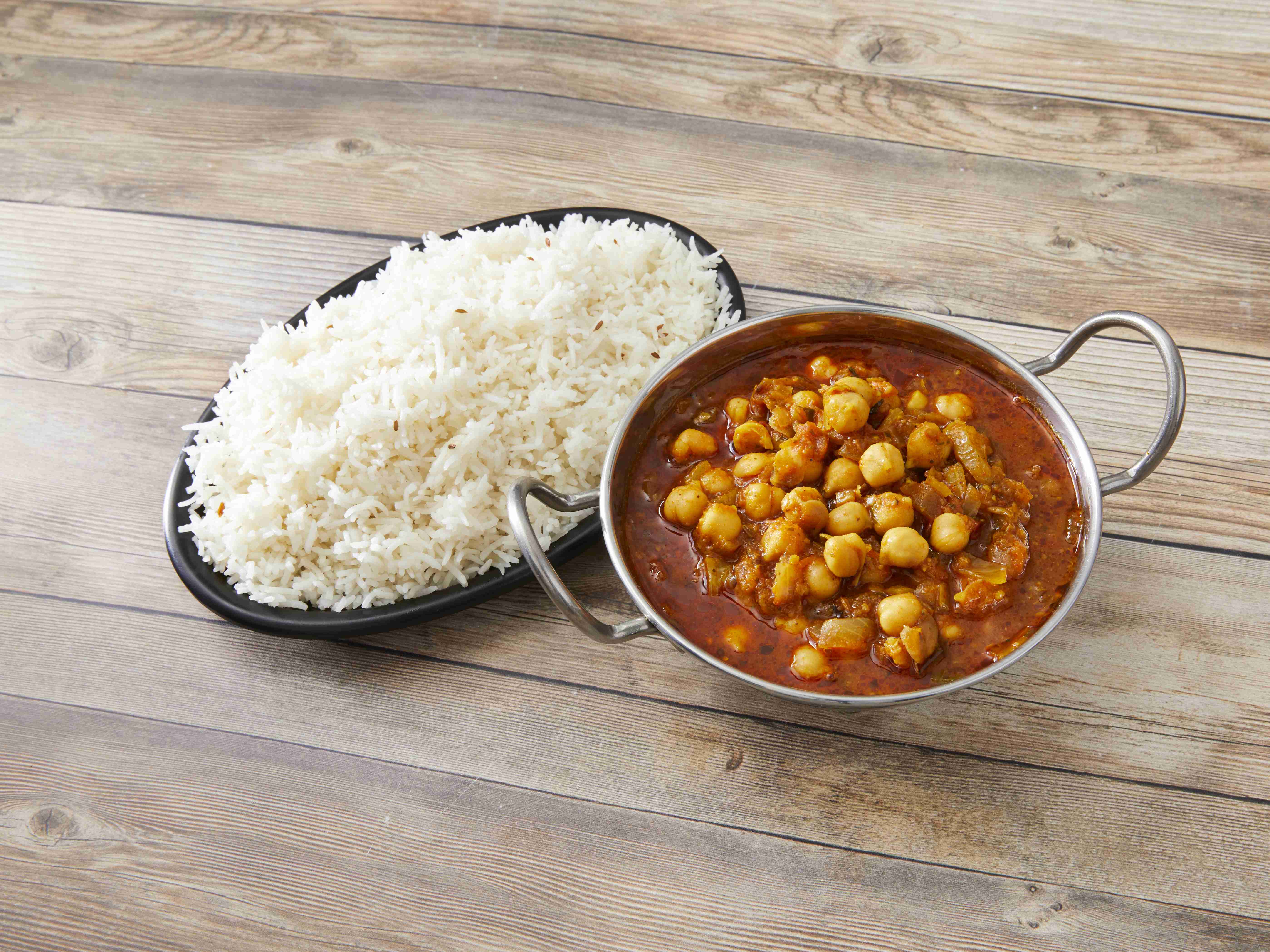 Order Channa Masala food online from Grill of India store, Flint on bringmethat.com