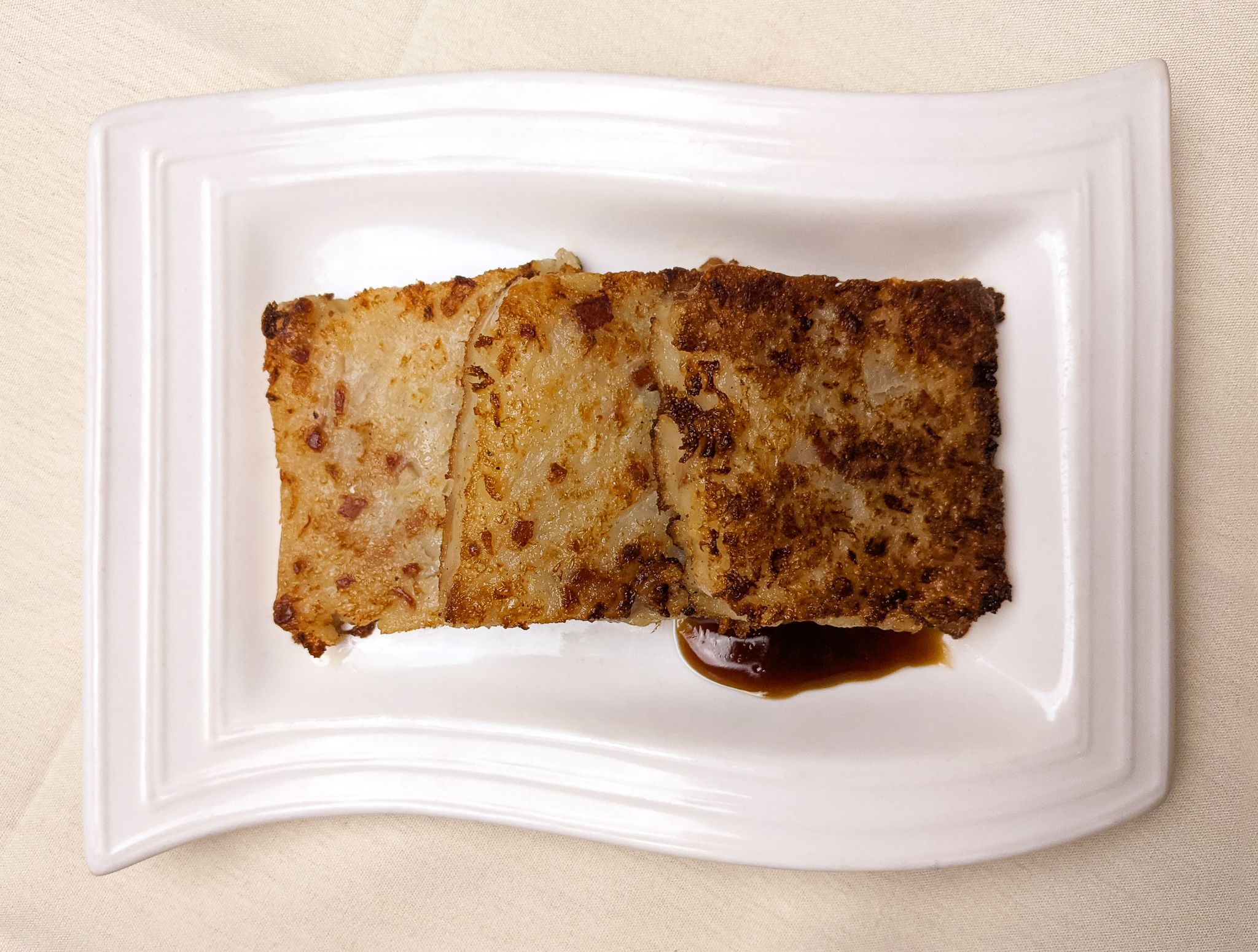 Order Pan Fried Turnip Cake food online from Evergreen on 38th Street store, New York on bringmethat.com