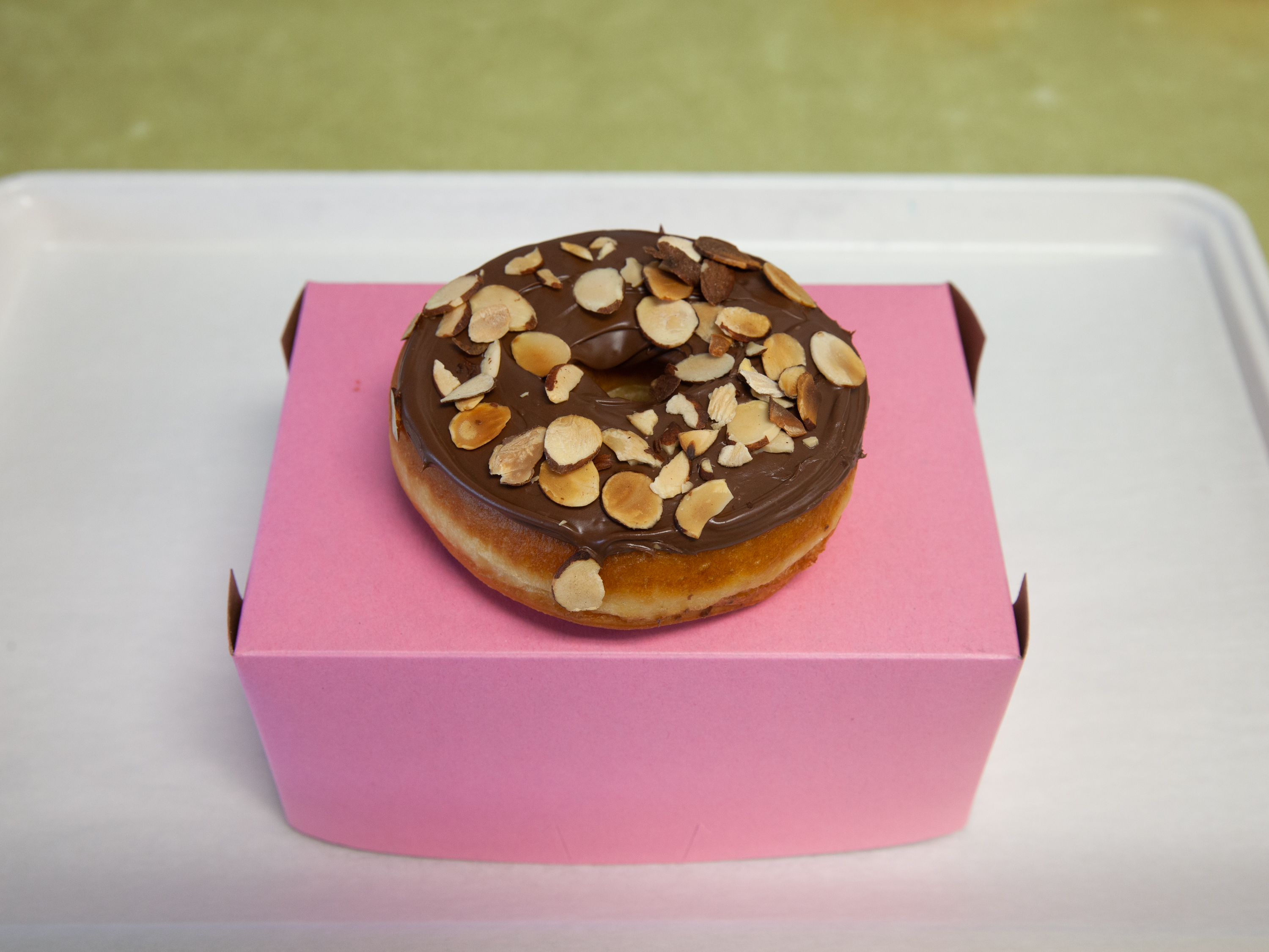 Order Nutella Almonds Donut food online from Donut Boy store, Salt Lake City on bringmethat.com