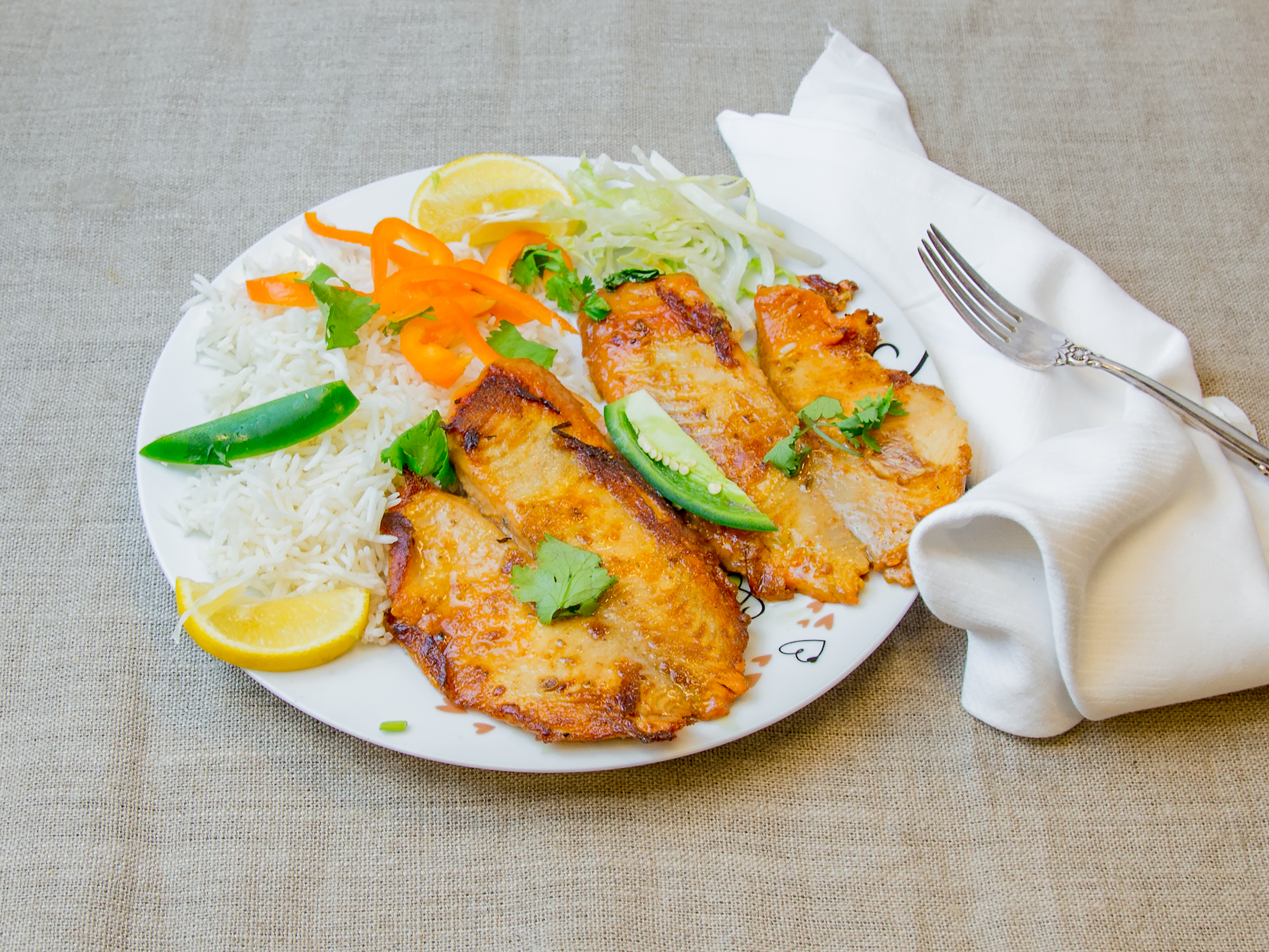 Order Grilled Fish with Rice and Salad food online from Halal Pita Grill store, Chicago on bringmethat.com