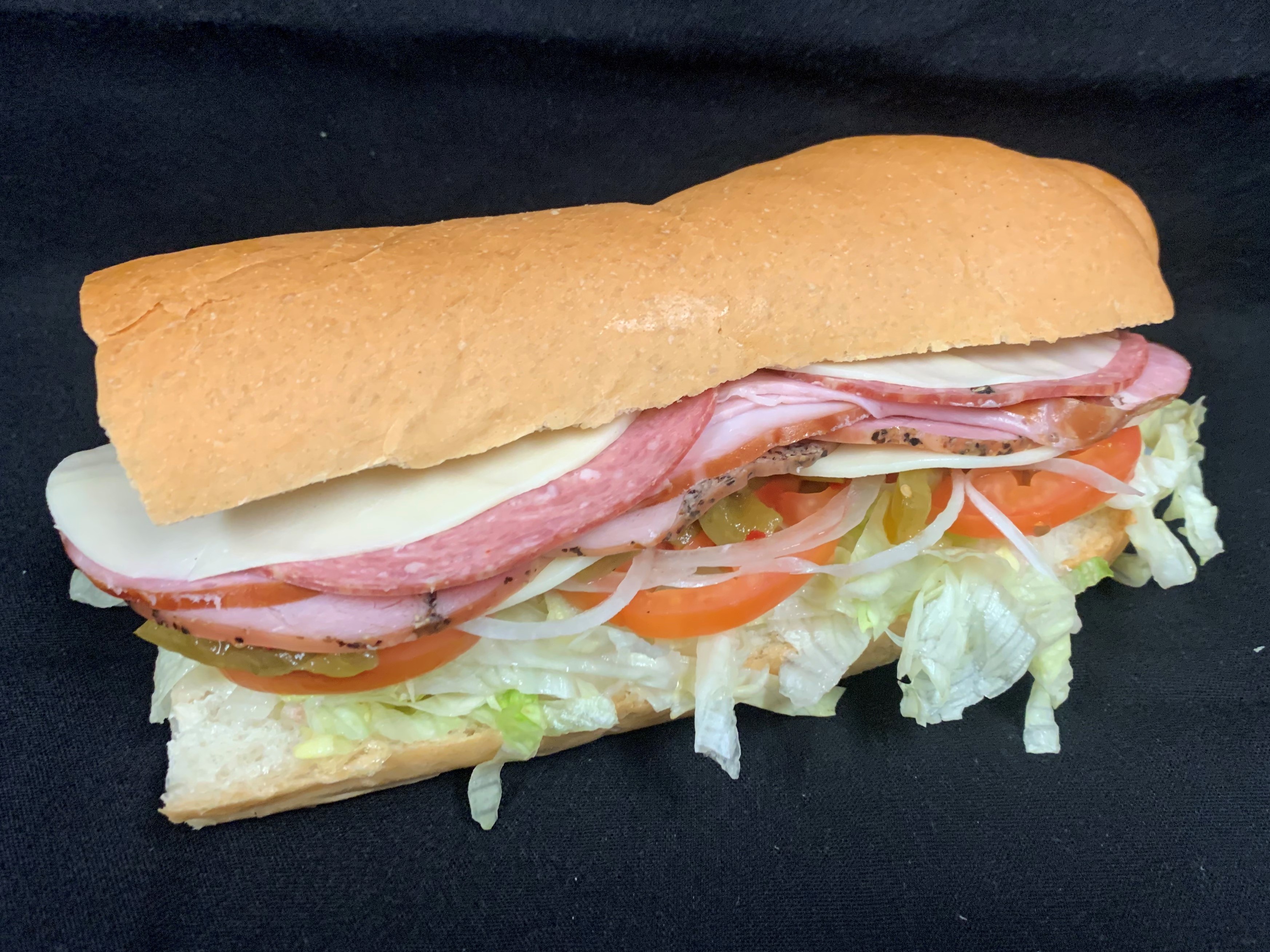 Order 2. Ham, Capicollo, Salami and Cheese Sub food online from Tony Subs & Pizza store, Inglewood on bringmethat.com