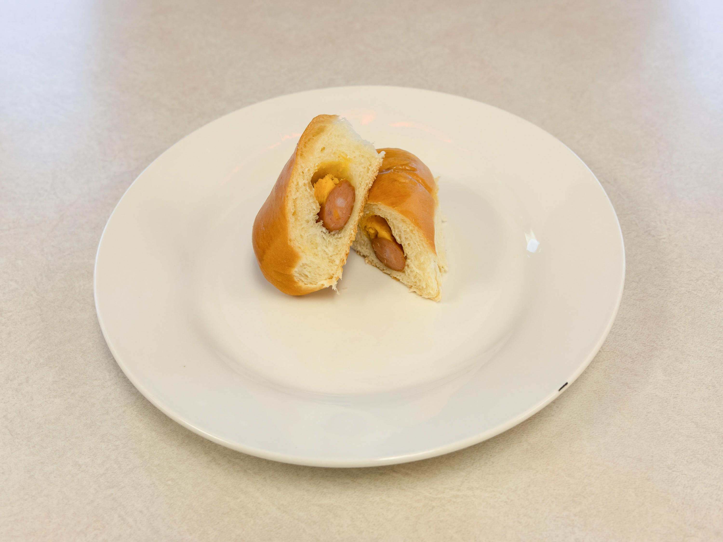 Order Sausage and Cheese Kolache food online from Mr. Donut And Kolache store, Jersey Village on bringmethat.com