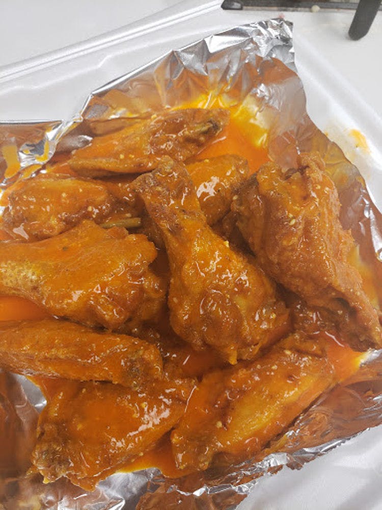 Order Hot Wings - 5 Pieces food online from Max Pizza store, Maxton on bringmethat.com