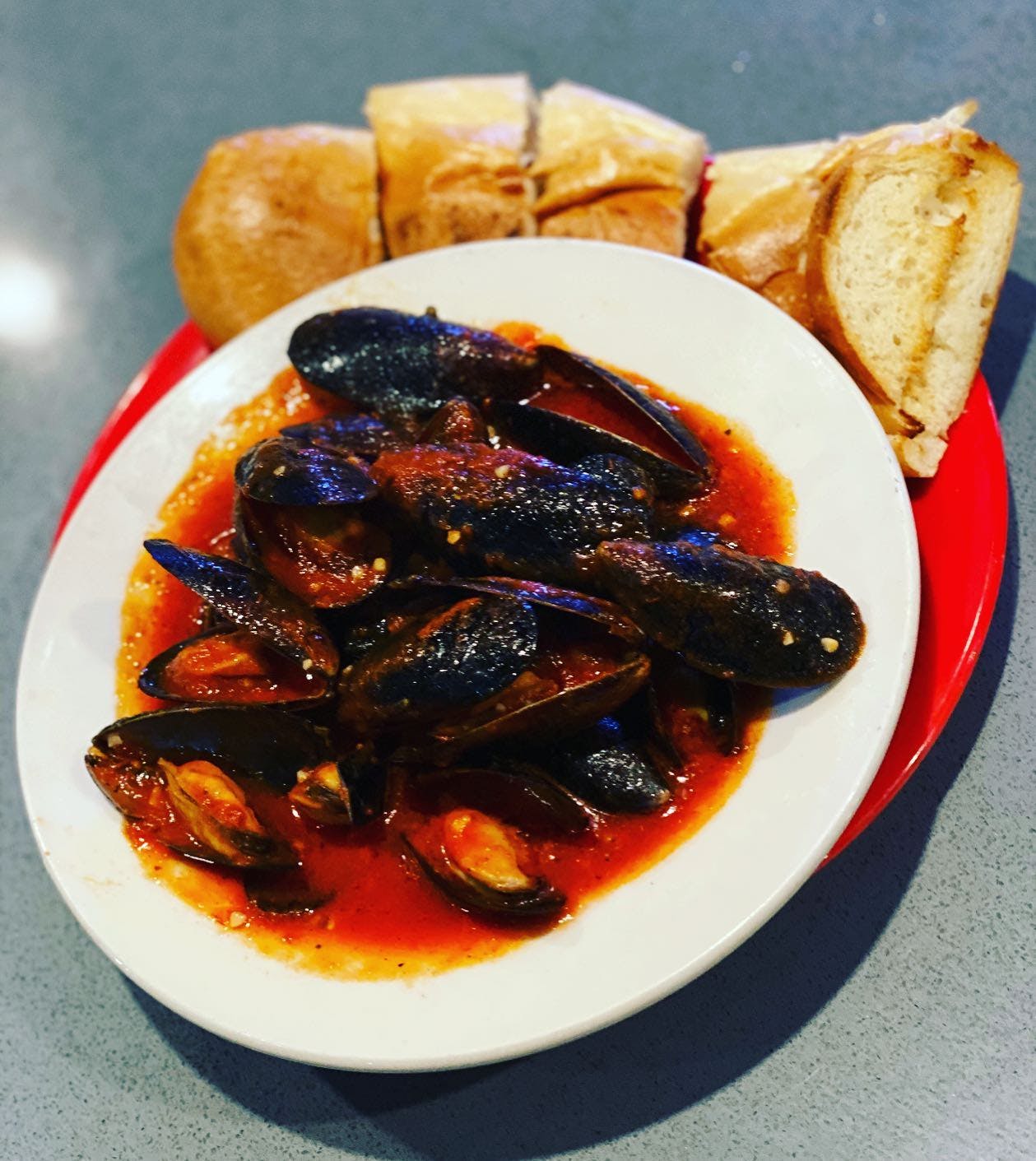Order Bowl of Mussels - 1 lb. food online from Franzone Pizzeria Restaurant & Sports Bar store, Conshohocken on bringmethat.com
