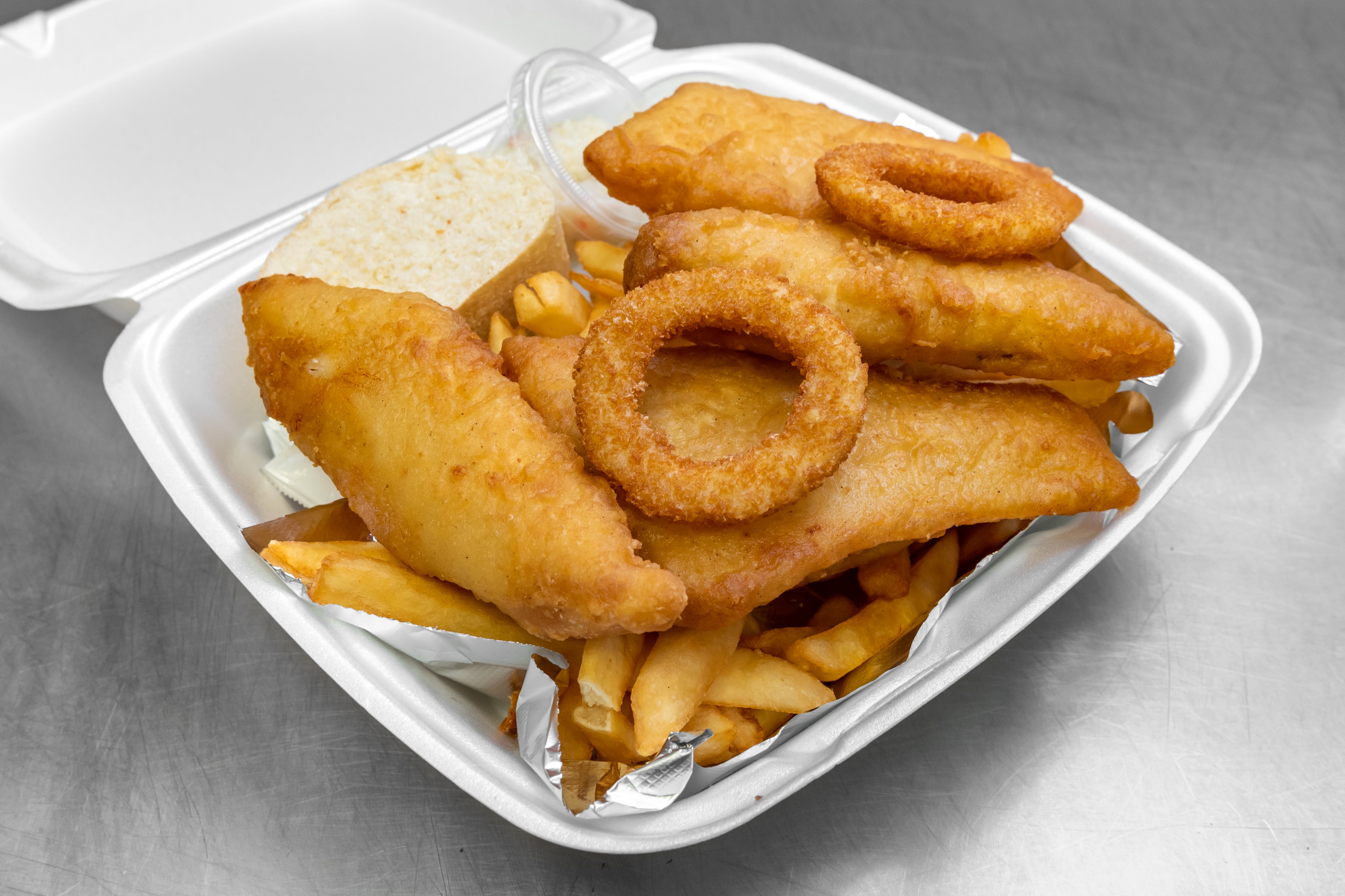 Order Beer Battered Fish Dinner - 3 Pieces food online from Zavarelli's Pizza Shop store, Canton on bringmethat.com