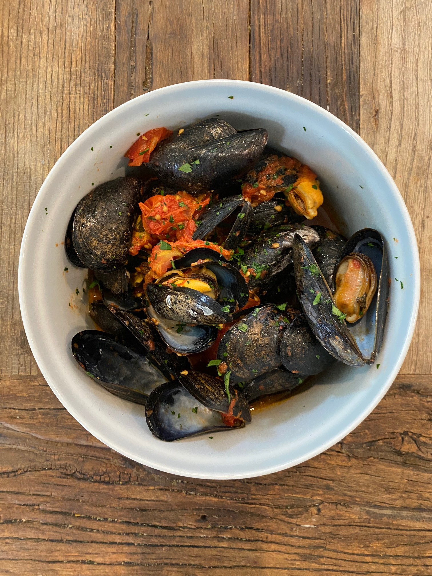 Order Cozze in Pomodoro food online from Reds (Trinidadian Food) store, Austin on bringmethat.com
