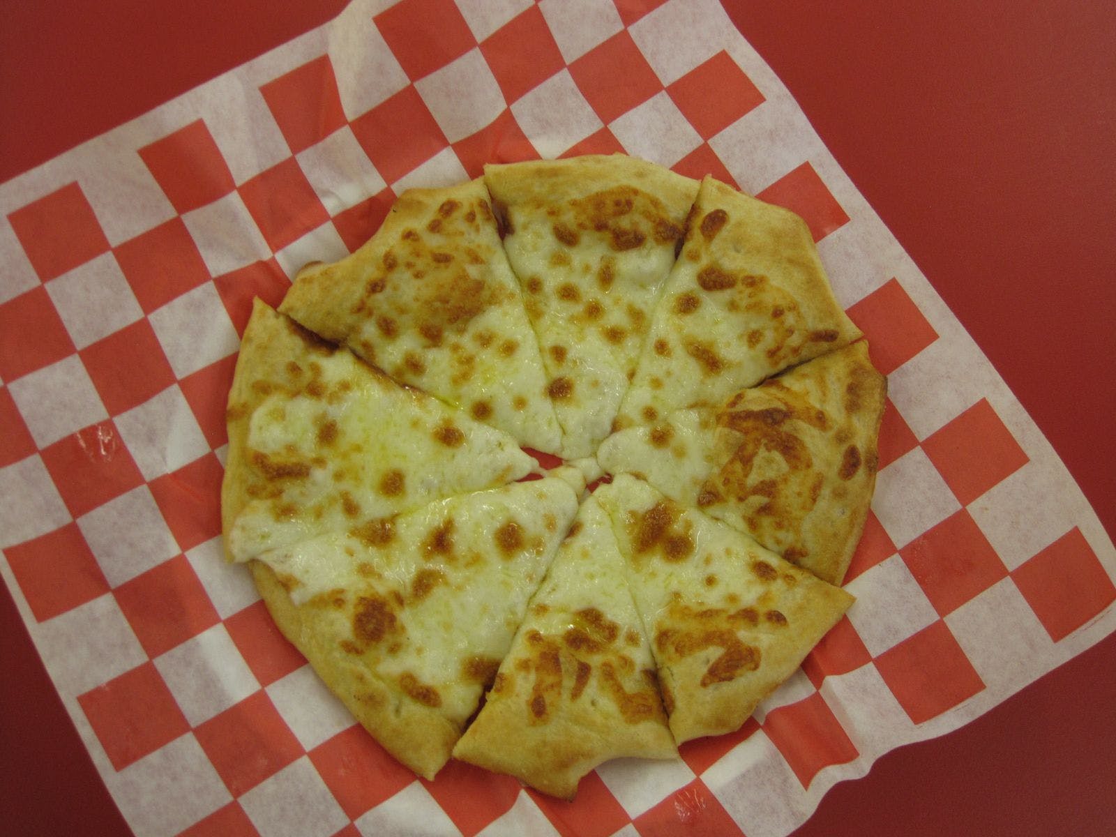 Order Cheesy Bread - Appetizer food online from Rocky's Pizzeria & Ice Cream store, North Chicago on bringmethat.com
