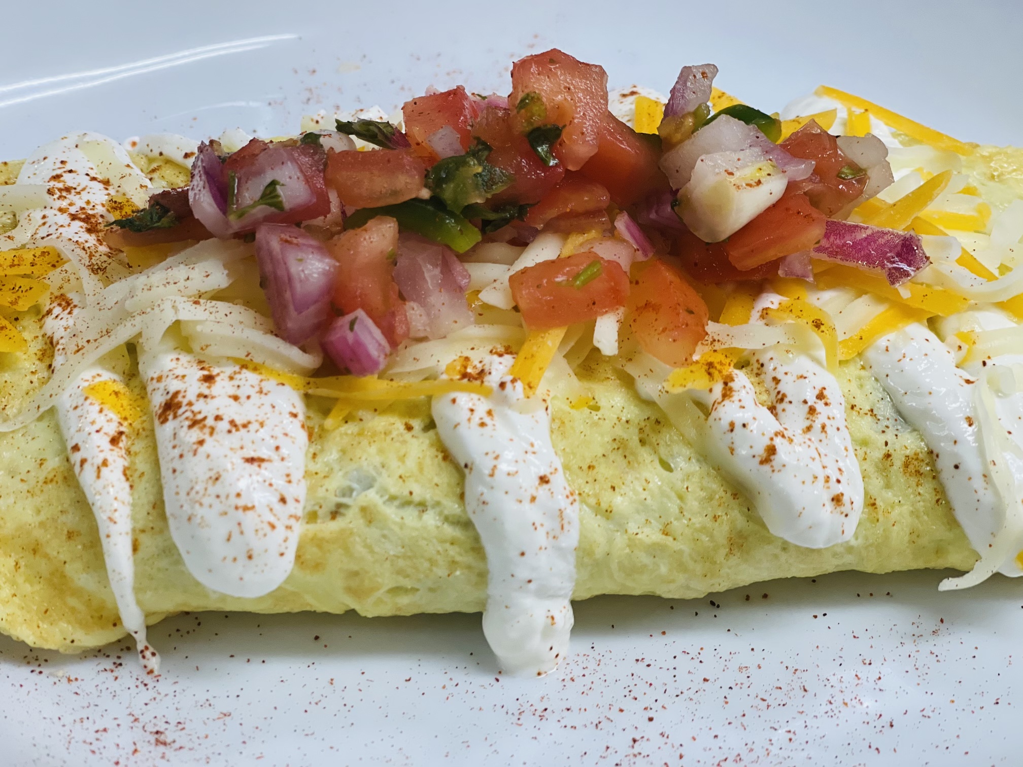 Order CHILLI OMELET food online from State Street Cafe store, North Haven on bringmethat.com