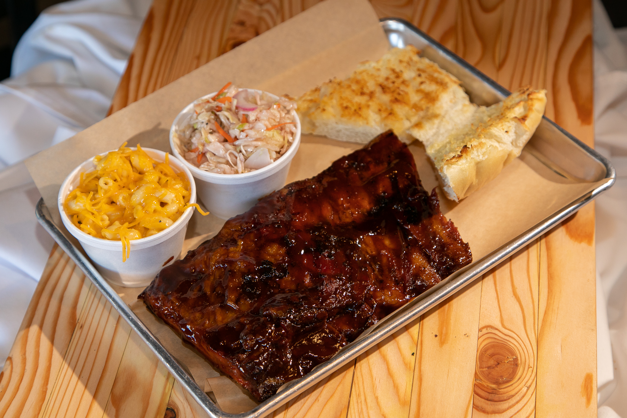 Order Sticky Ribs food online from Brushfire BBQ store, Tucson on bringmethat.com