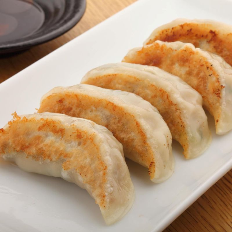 Order A10. Peking Ravioli food online from Blue Fuji Organic Restaurant store, Medford on bringmethat.com