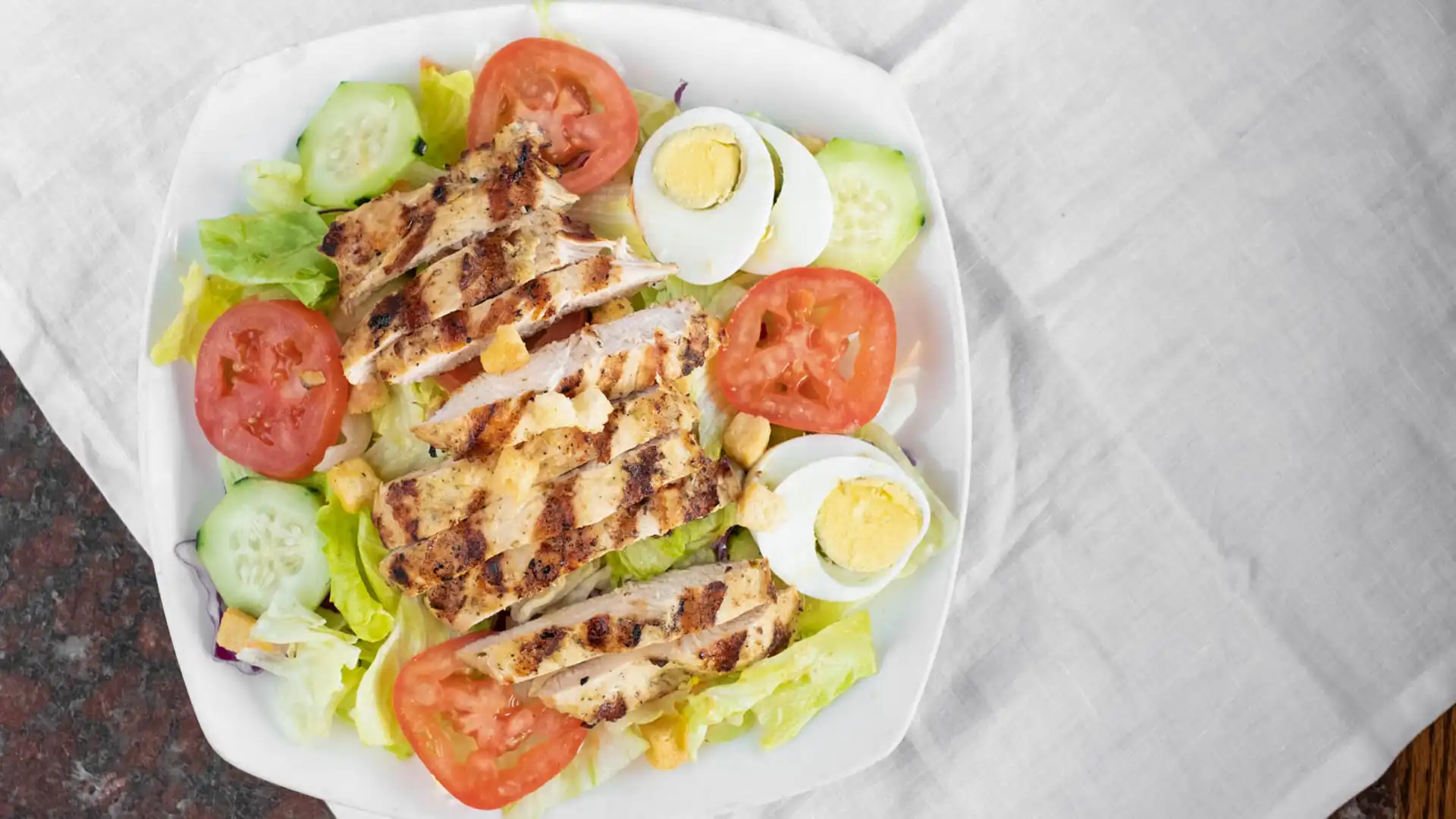 Order Grilled Chicken Salad with Pita Bread food online from Jim Burgers store, El Monte on bringmethat.com