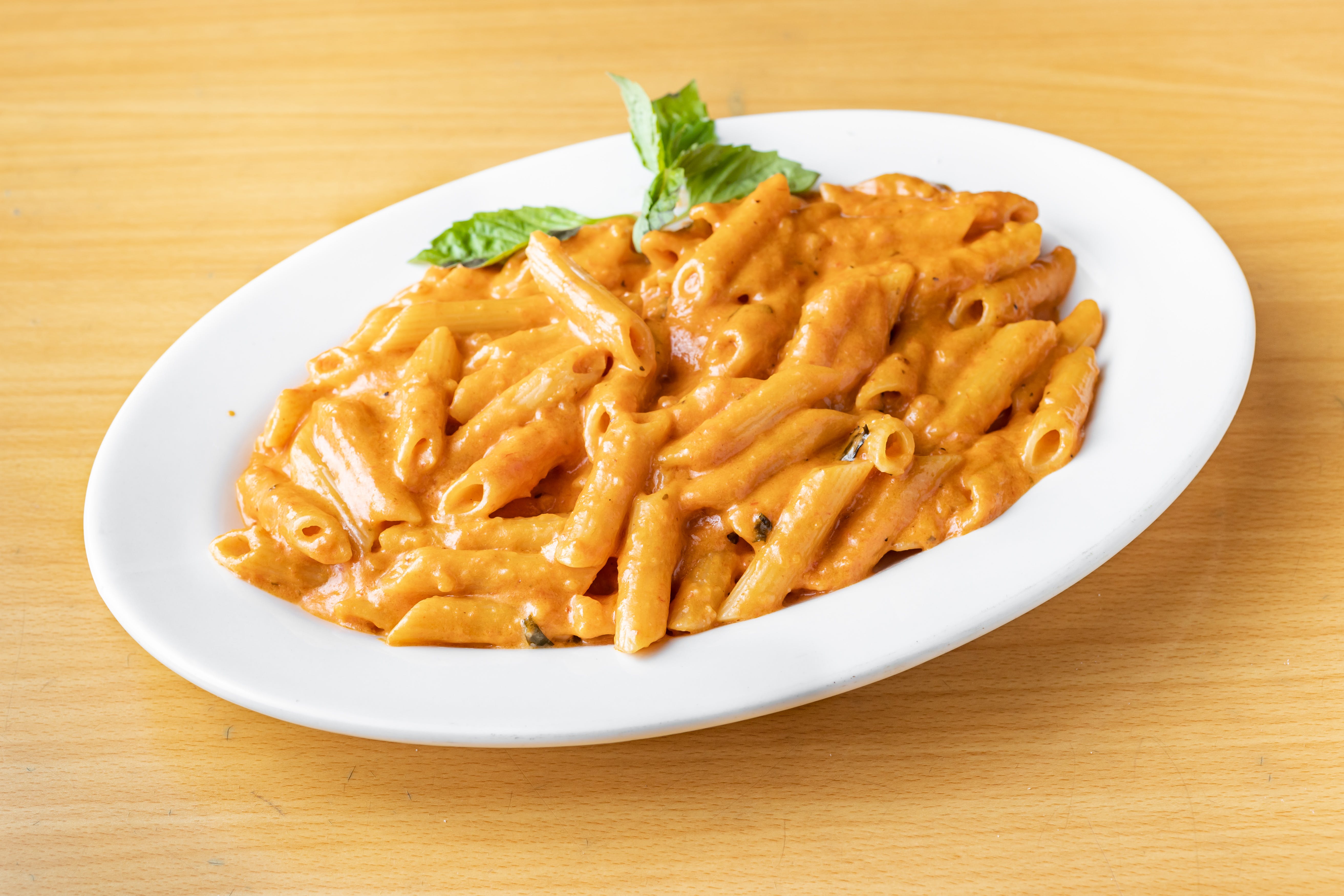 Order Penne Ala Vodka - Pasta food online from Sicilia D'Oro store, Valley Stream on bringmethat.com