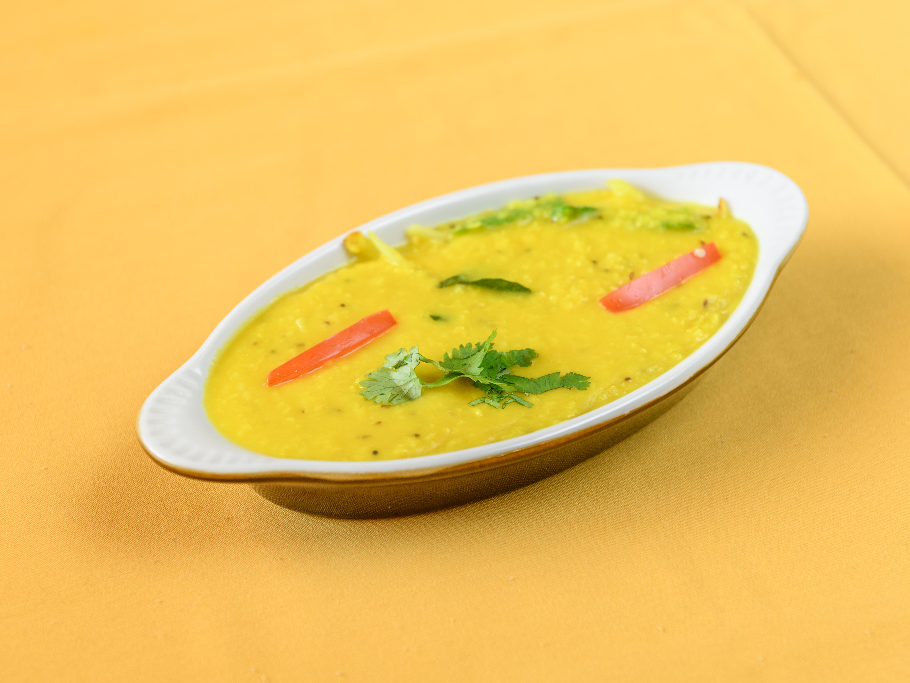 Order Daal Tadka food online from Taj Cuisine of India store, Oklahoma City on bringmethat.com
